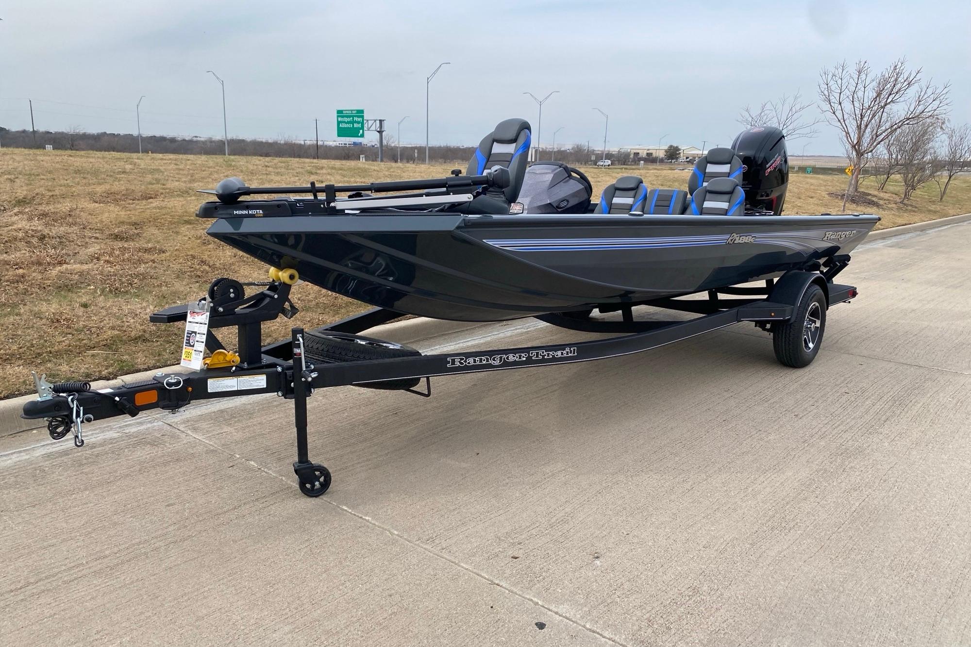 2026 Ranger RT188C boat on trailer, parked on roadside, featuring sleek design and modern features.