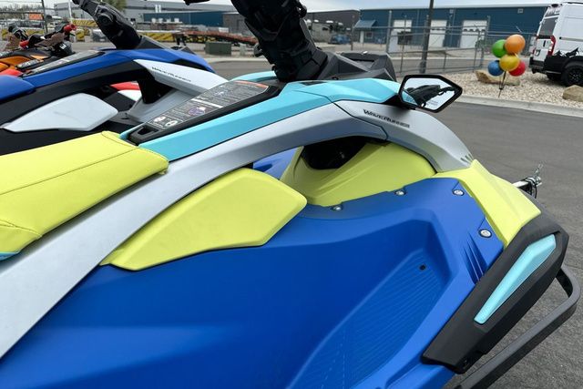 Yamaha WaveRunner Jetblaster Pro in blue and yellow on a parking lot.
