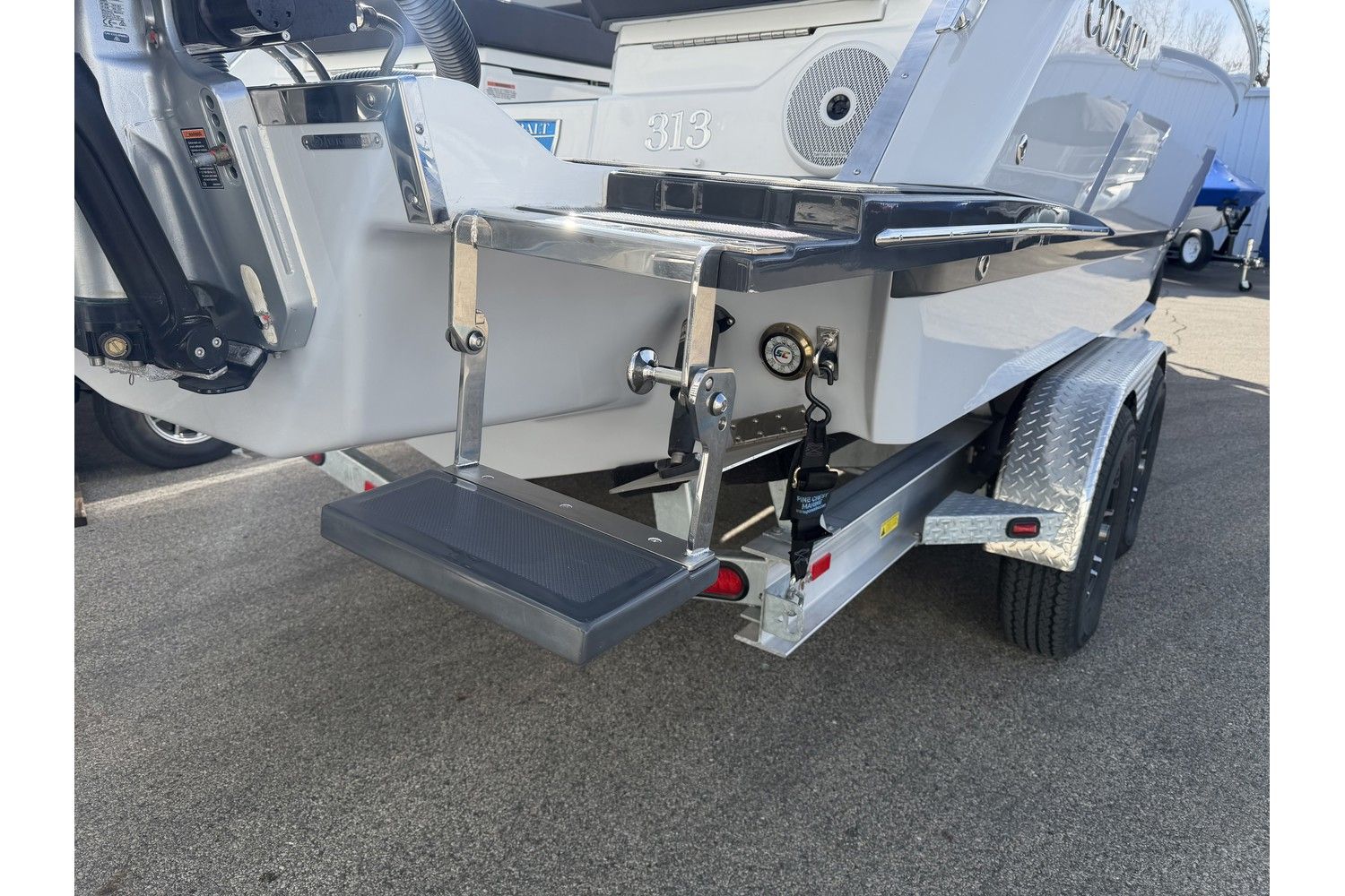 The image shows the stern of a Cobalt R8 Outboard boat with a swim platform.