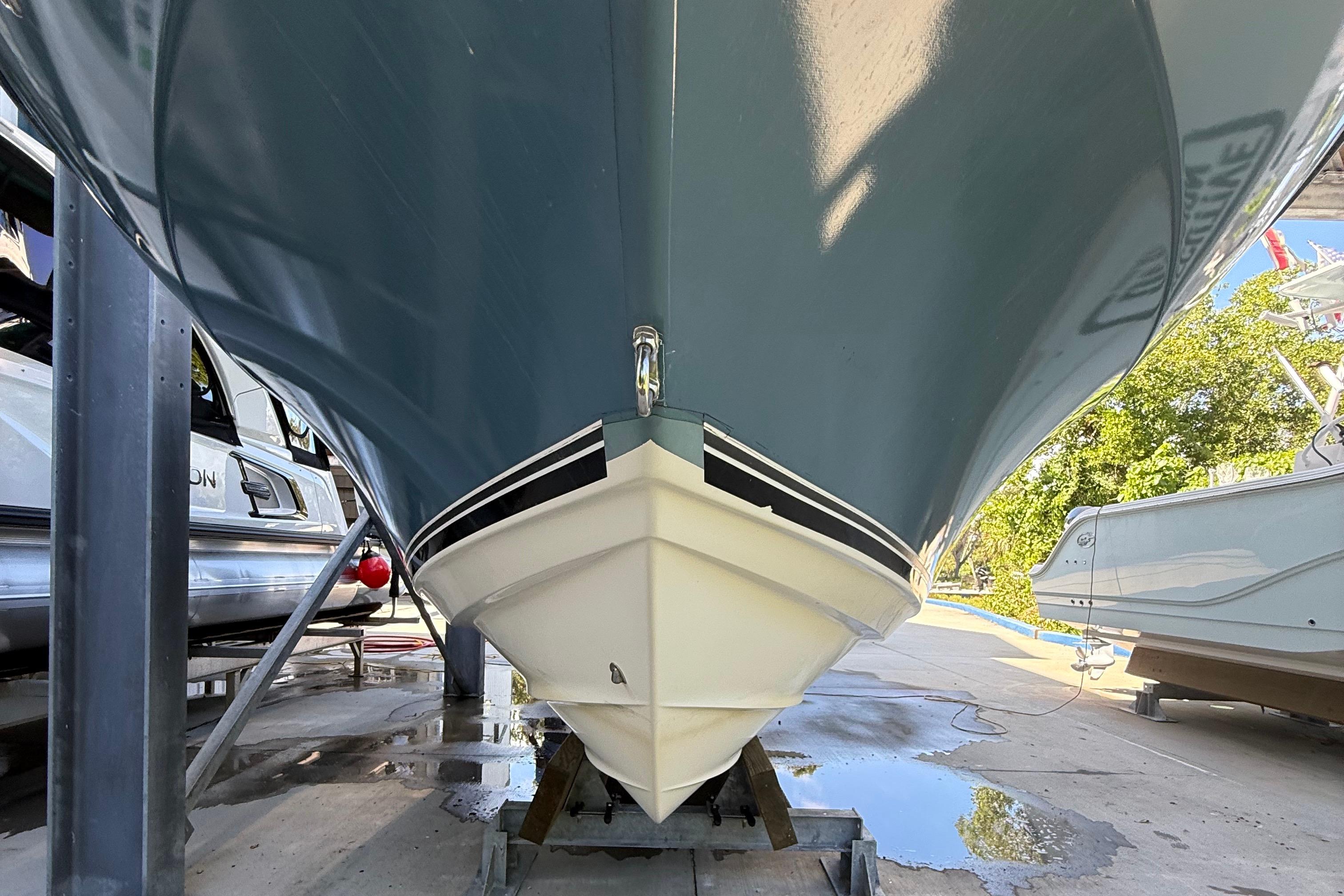 2008 Century 2901 Center Console boat on a trailer, viewed from the front.