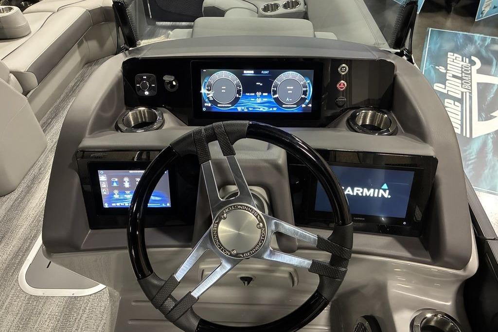 2025 Bennington LX Sport Quad Bench 24 LXSFBA dashboard with Garmin navigation and modern controls.