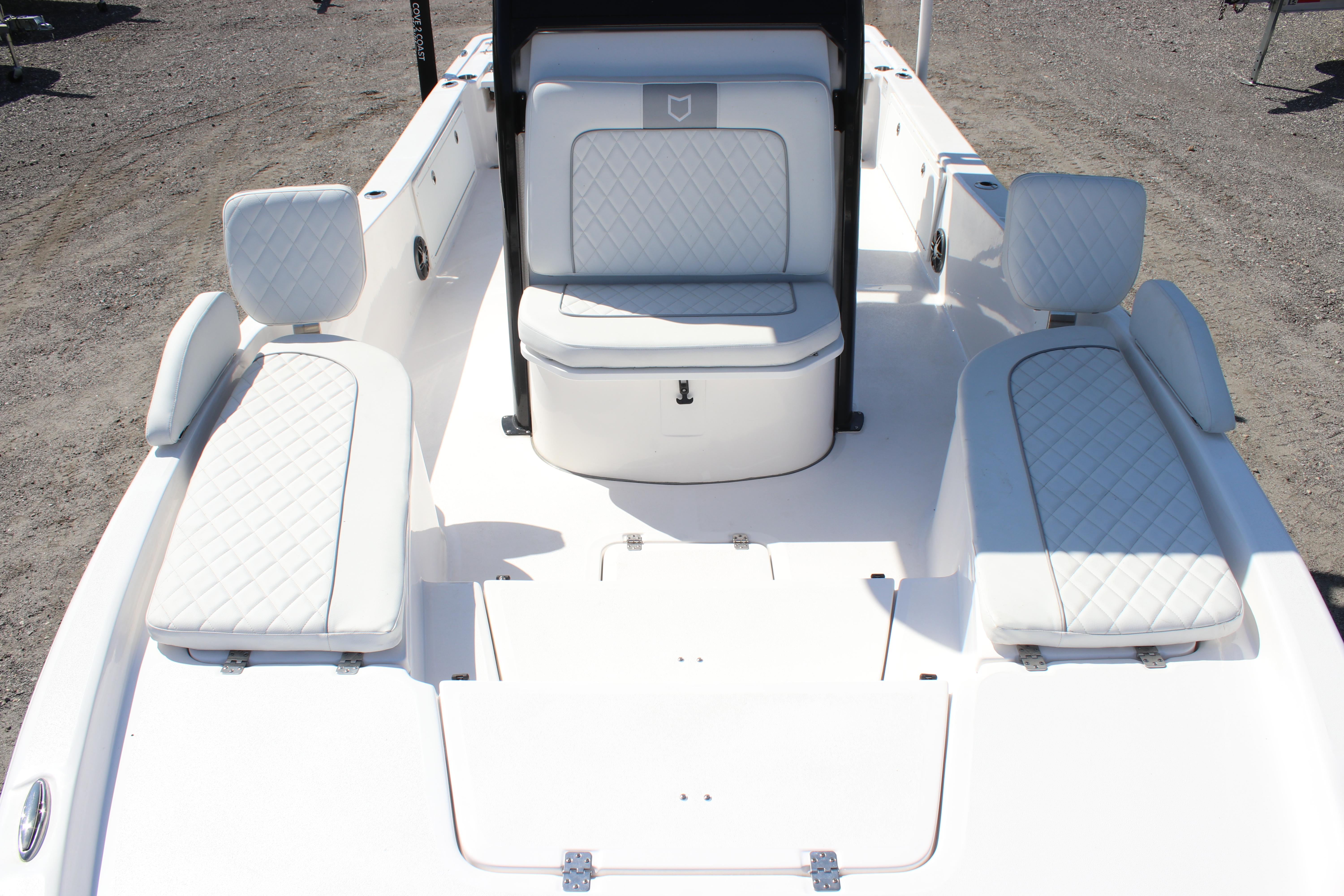 2025 Sea Fox 251 Bay Fox boat interior with white cushioned seating.