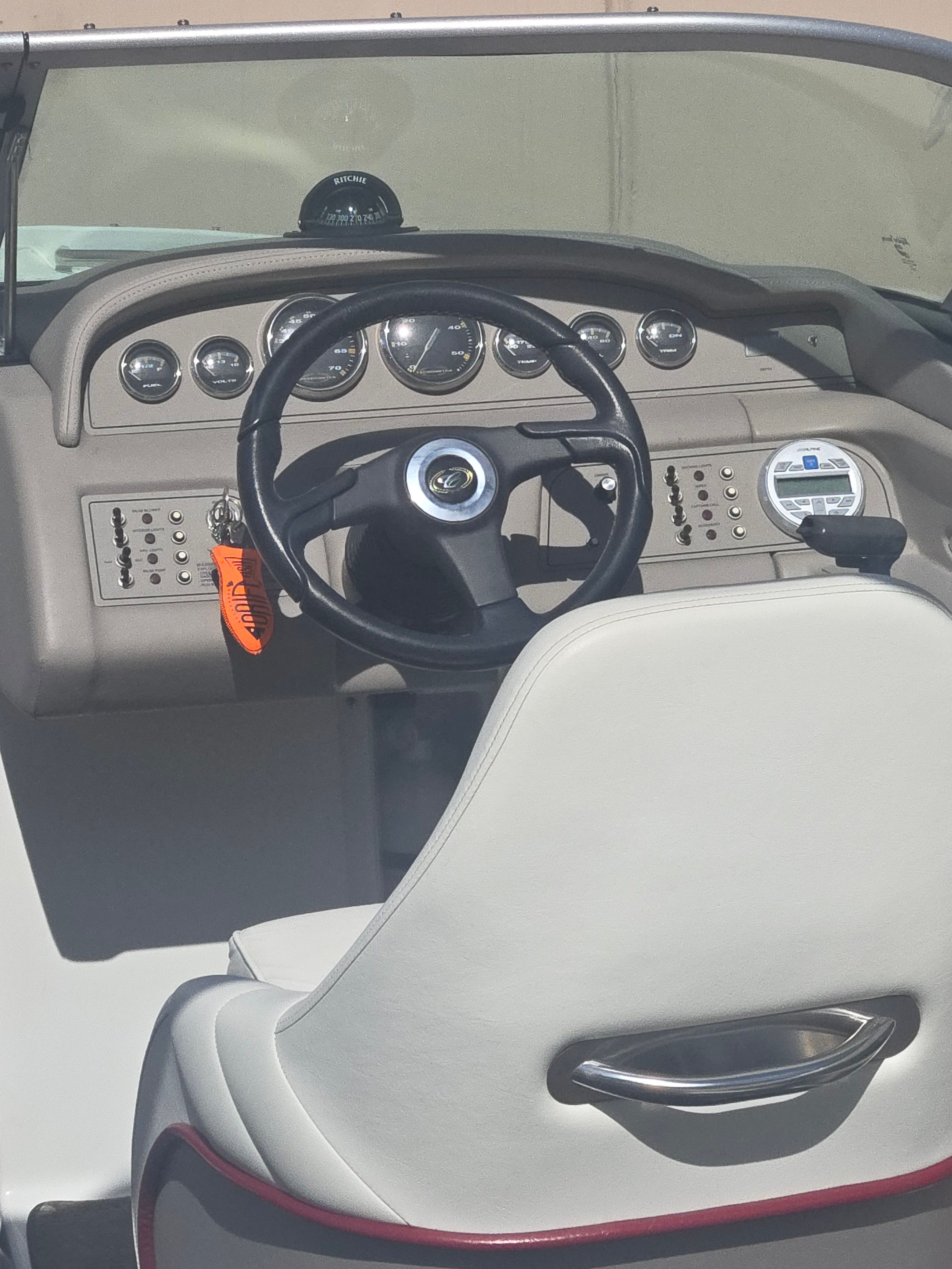 Interior view of a 2001 Cobalt 226 boat with steering console.