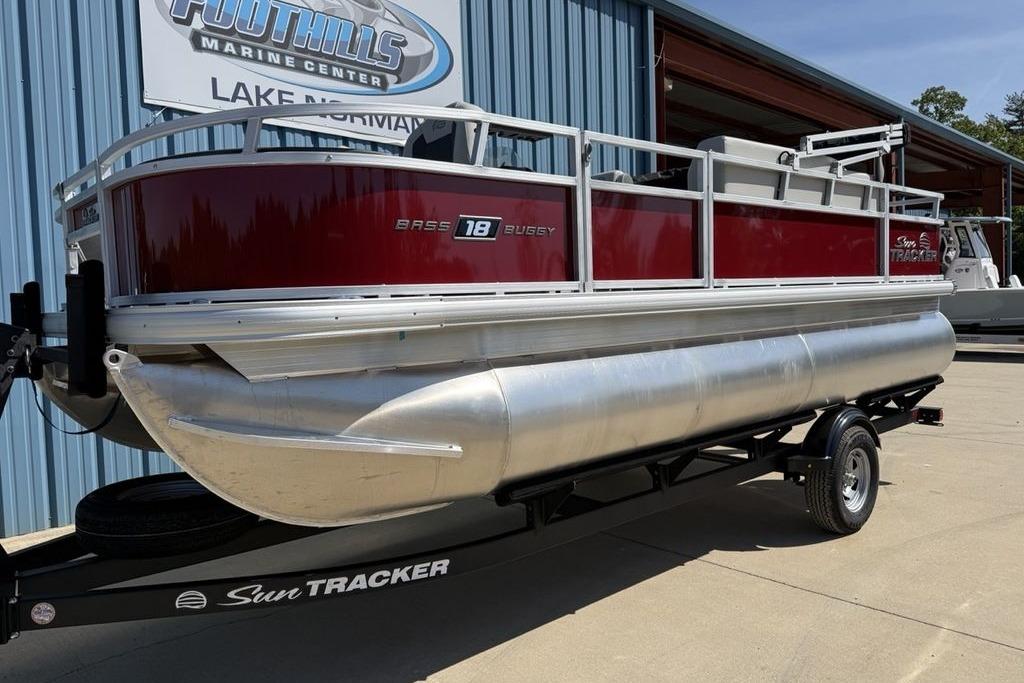 2026 Sun Tracker Bass Buggy 18 DLX pontoon boat on trailer at Foothills Marine Center.