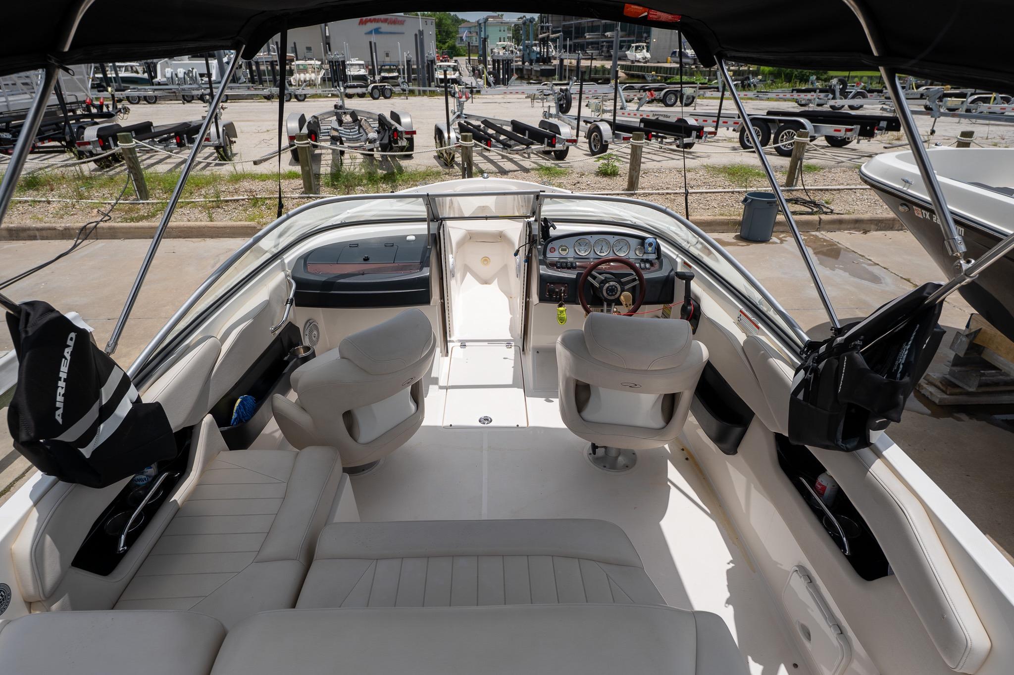 Interior view of a 2008 Regal 2000 Bowrider boat with seating and dashboard.
