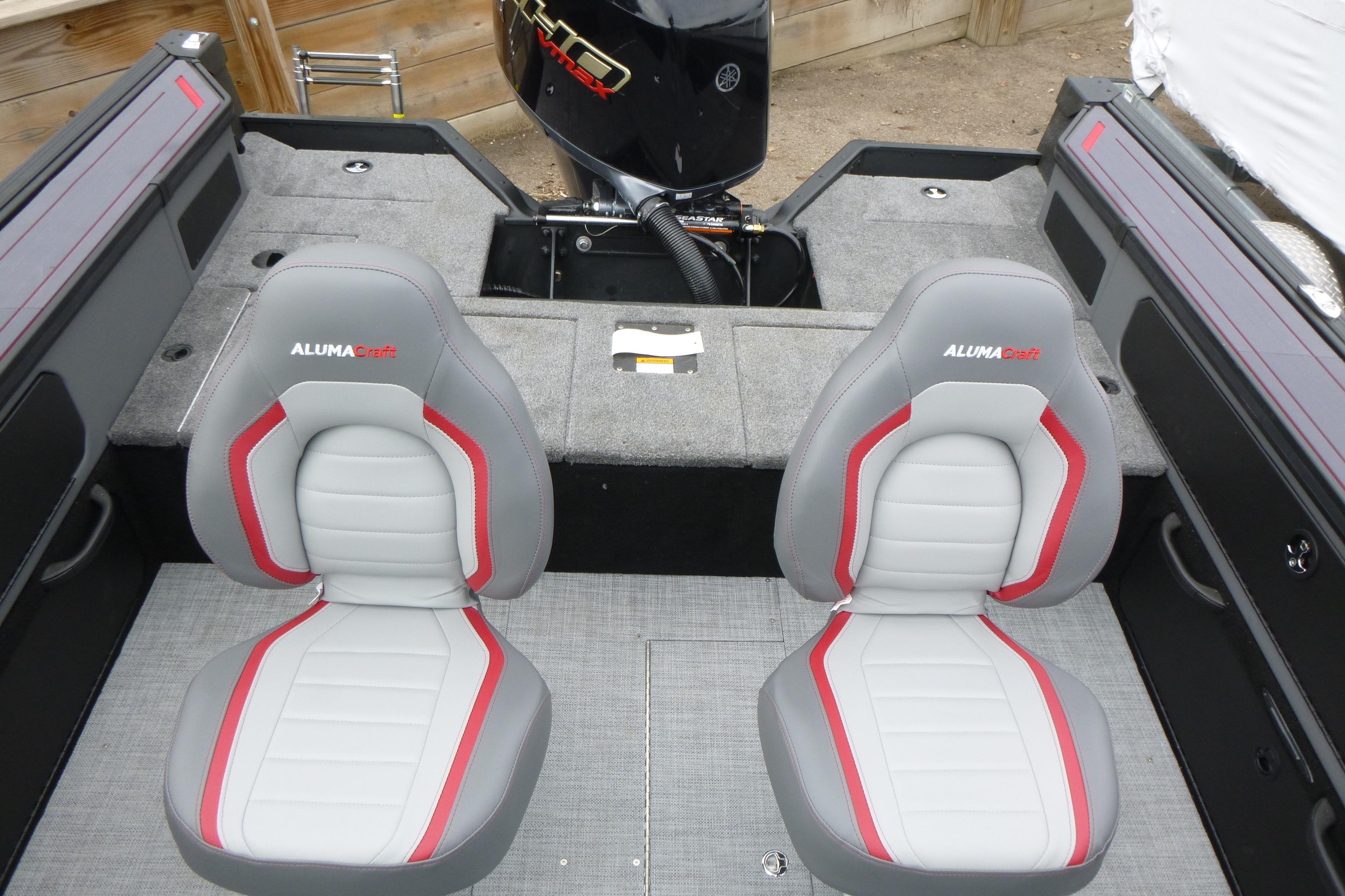 2025 Alumacraft Trophy 185X Sport boat interior with two gray and red seats.