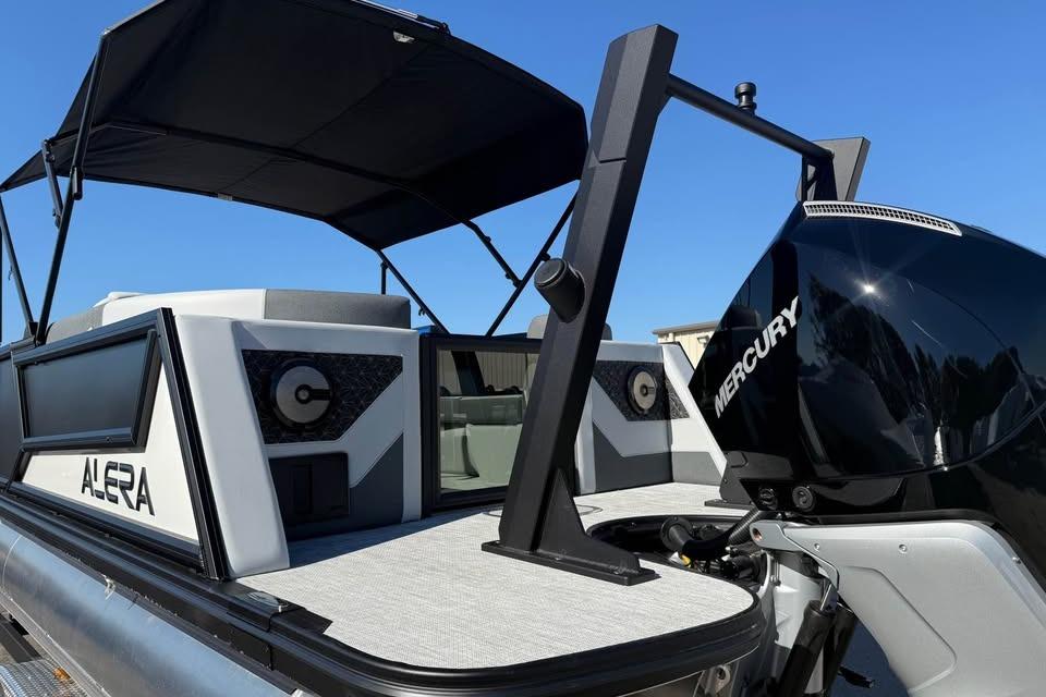 2026 Alera M 25Q boat with Mercury engine, featuring sleek design and canopy.