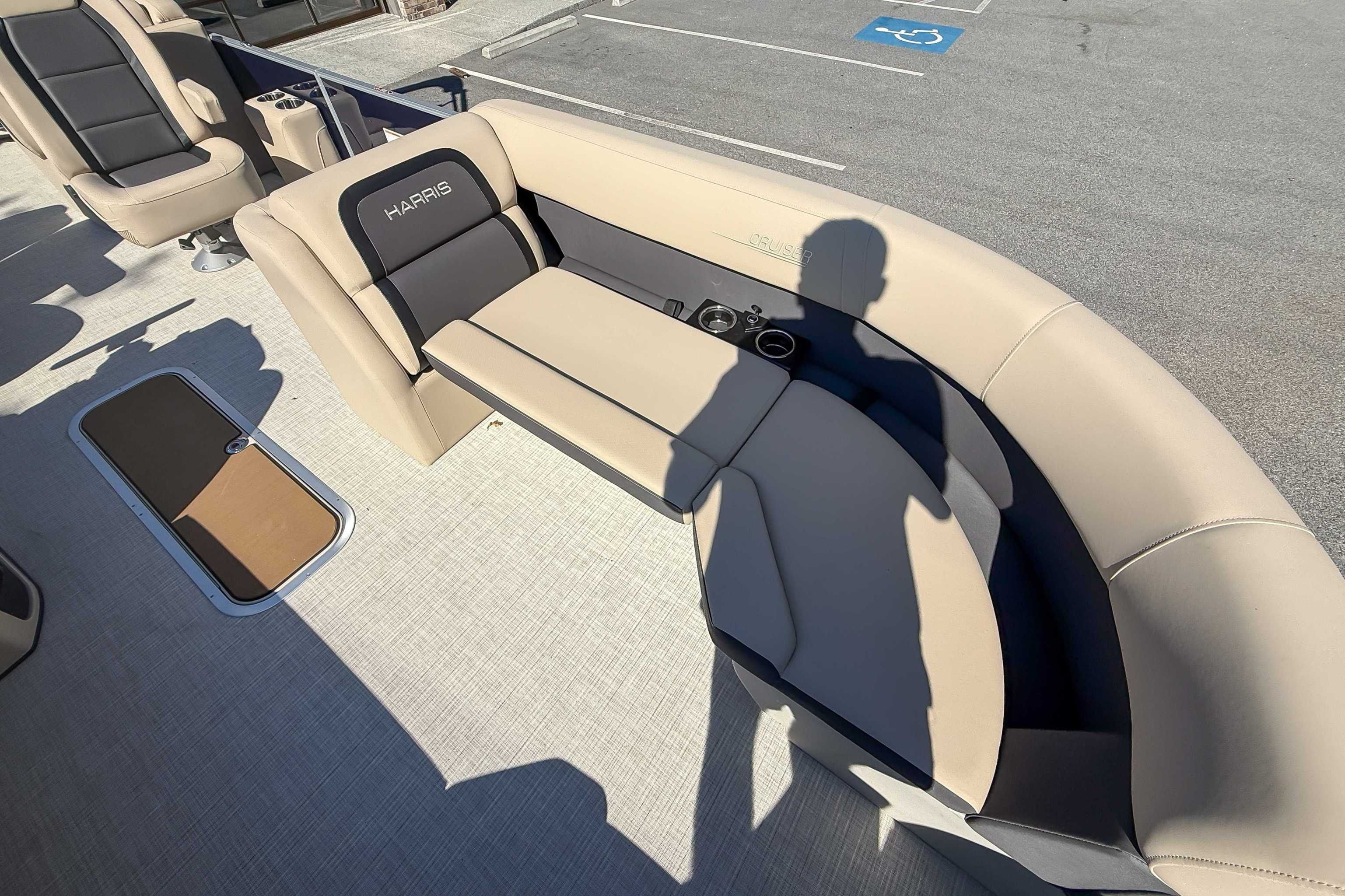 Interior of 2025 Harris Cruiser 250 CWDH with beige seating.
