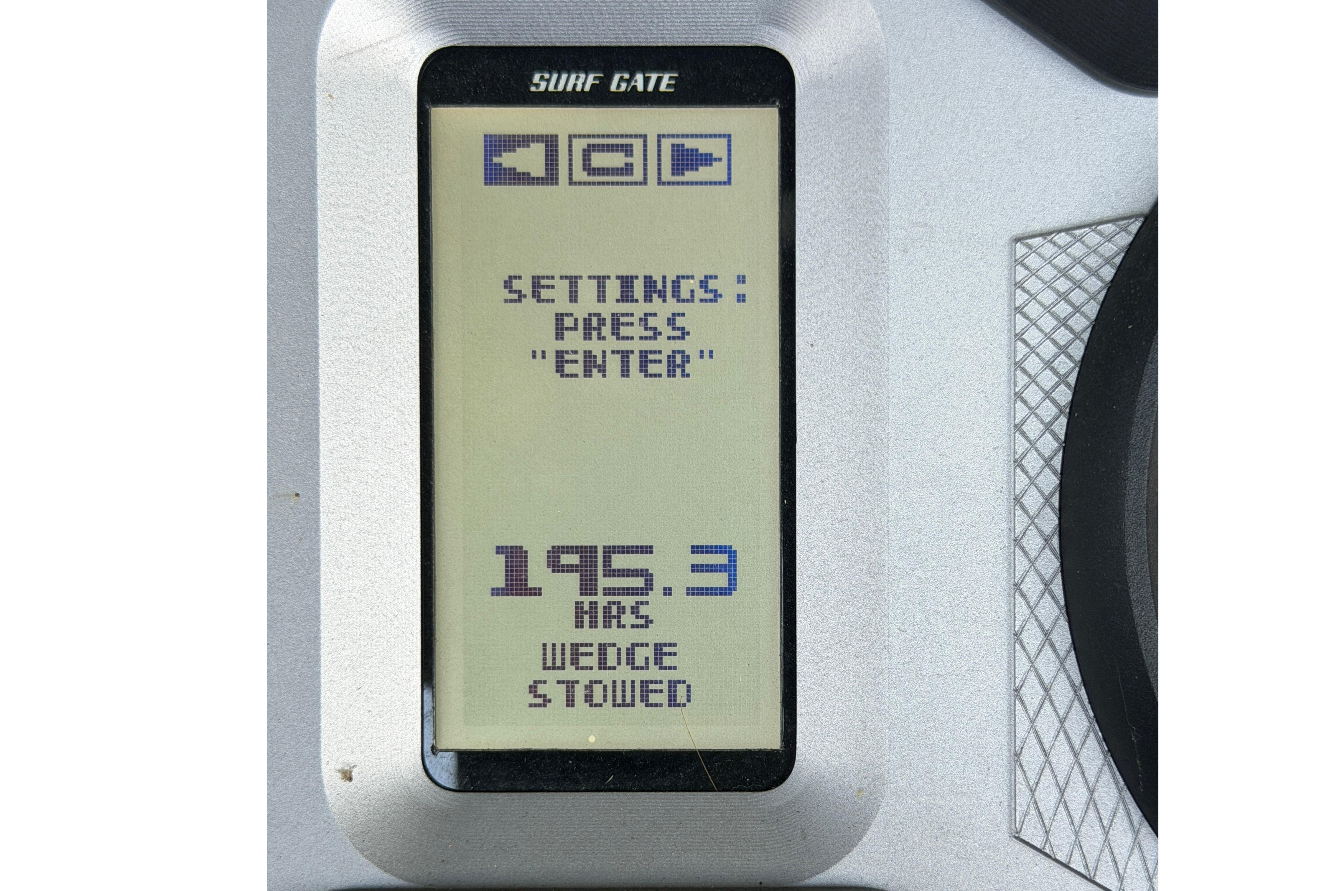Display screen of 2021 Axis A24 boat showing 195.3 hours and settings instructions.