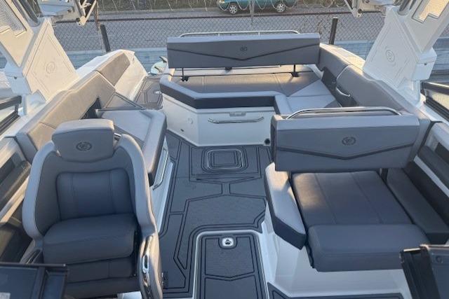 2023 Cobalt R6 Surf boat interior with sleek gray seating and modern design.
