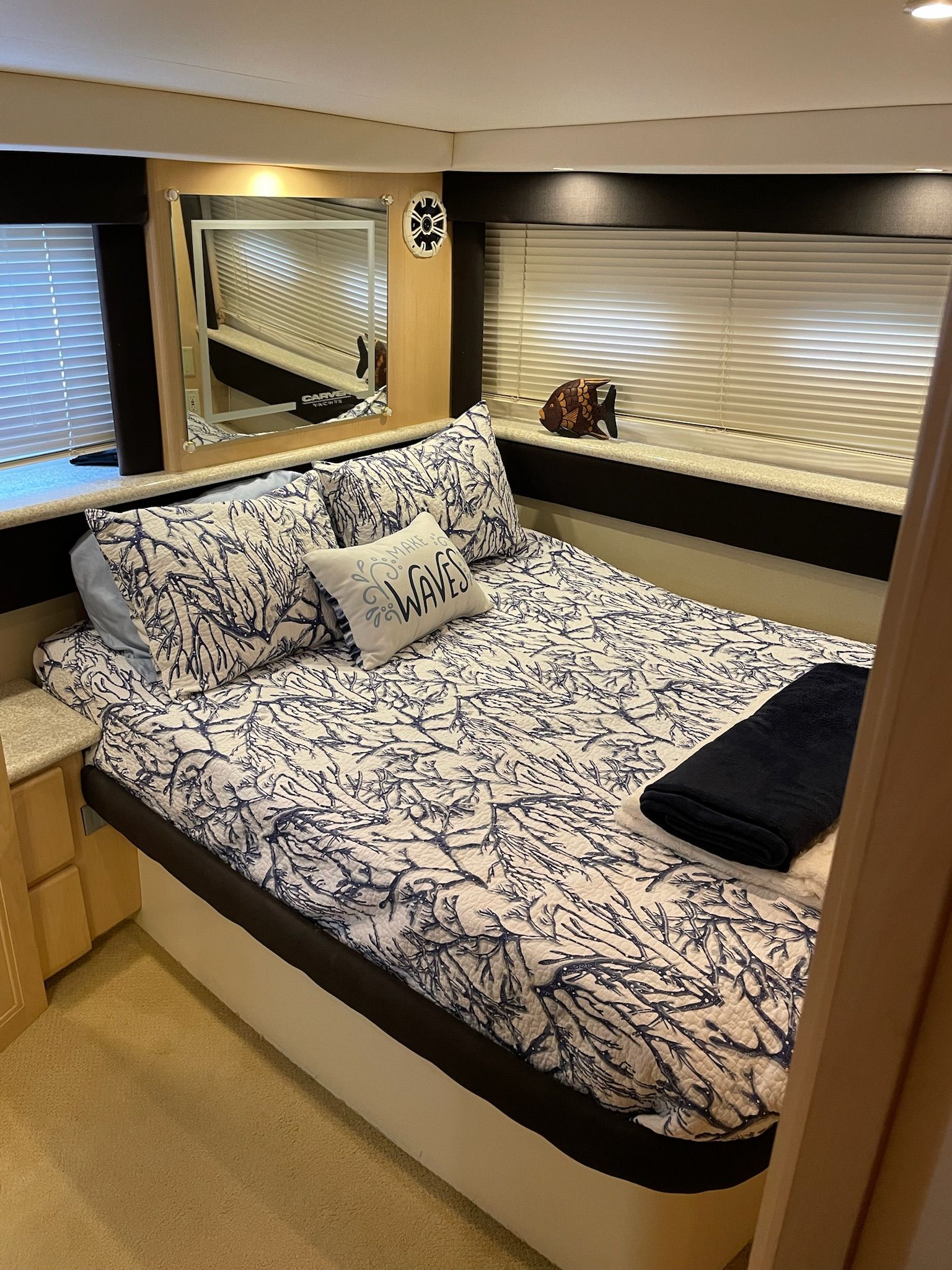 Interior of Carver 356 Yacht with cozy bedroom.