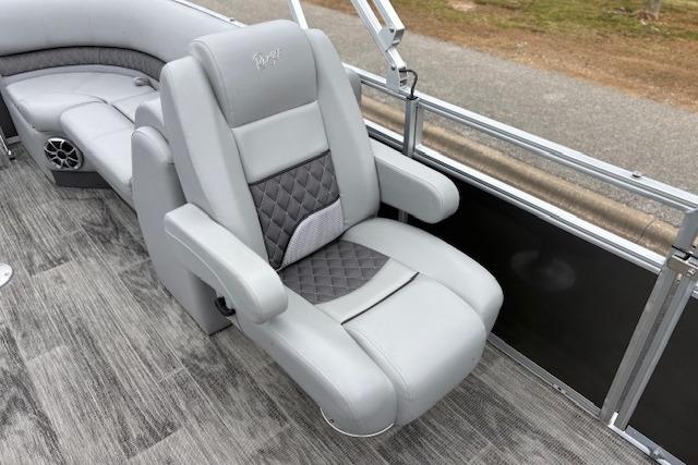 Luxurious seating on 2025 Ranger Reata 243C pontoon boat, featuring elegant gray upholstery.