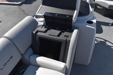 2026 Lowe SF 212 Sport Fish boat interior with seating and storage compartment.
