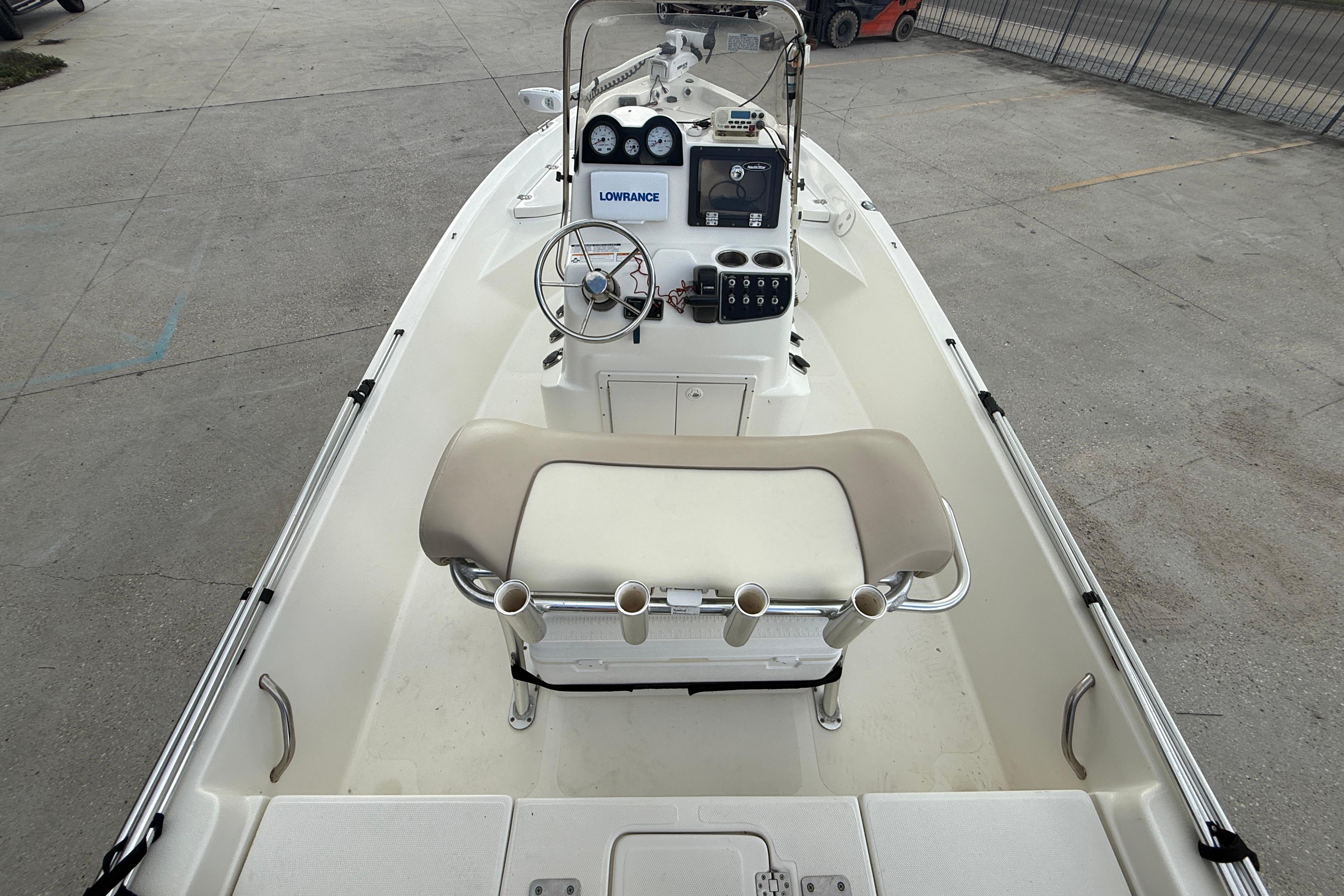 2017 NauticStar 1910 NauticBay boat interior with steering console and seating.