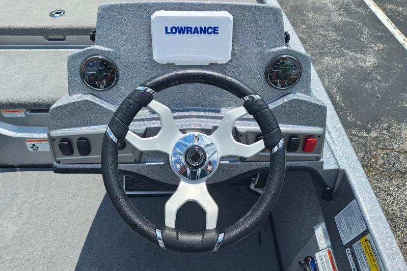 Steering console of 2026 Nitro Z19 XL boat with Lowrance display and gauges.