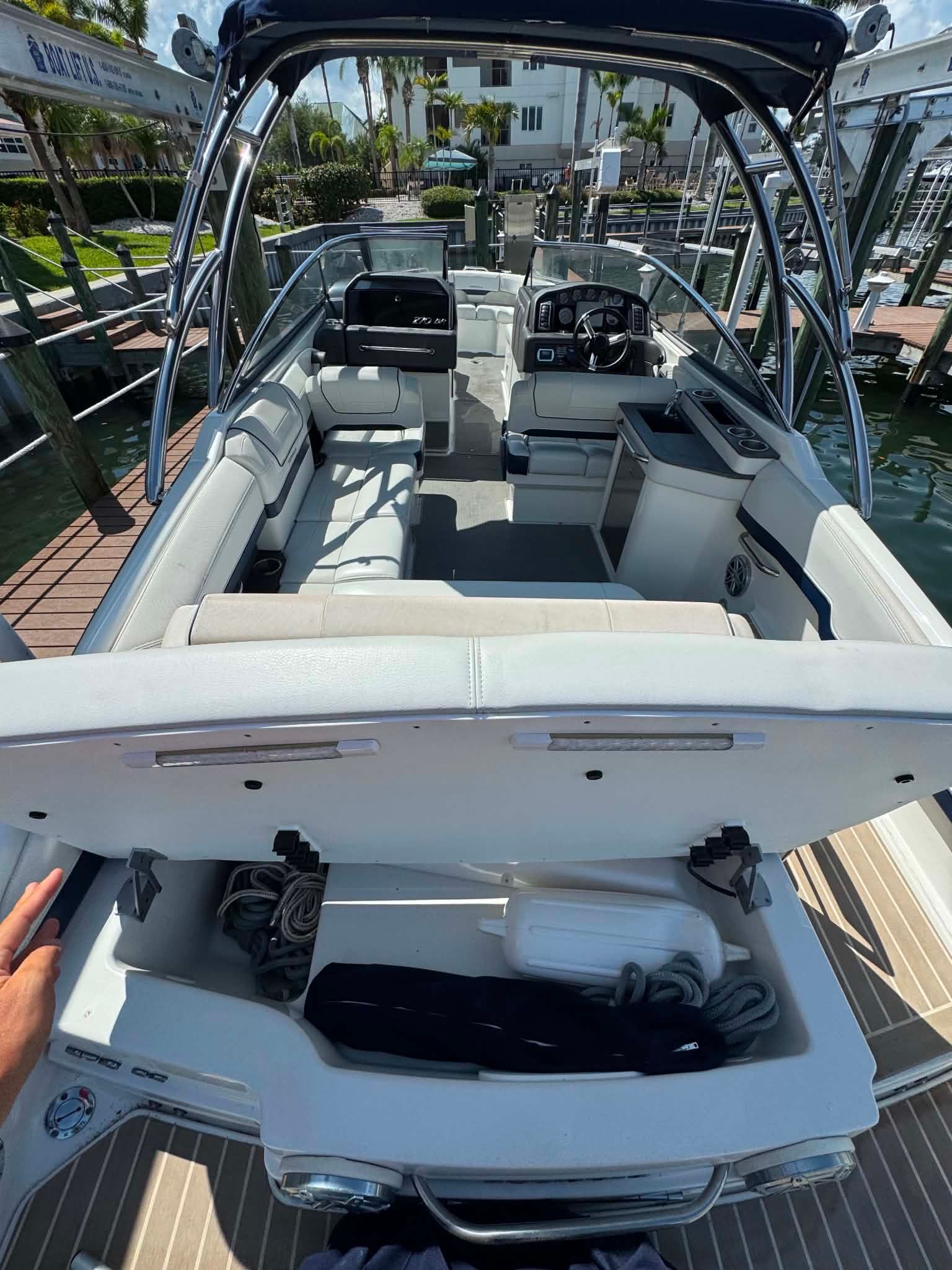 Interior view of a 2018 Formula 270 Bowrider boat at dock.