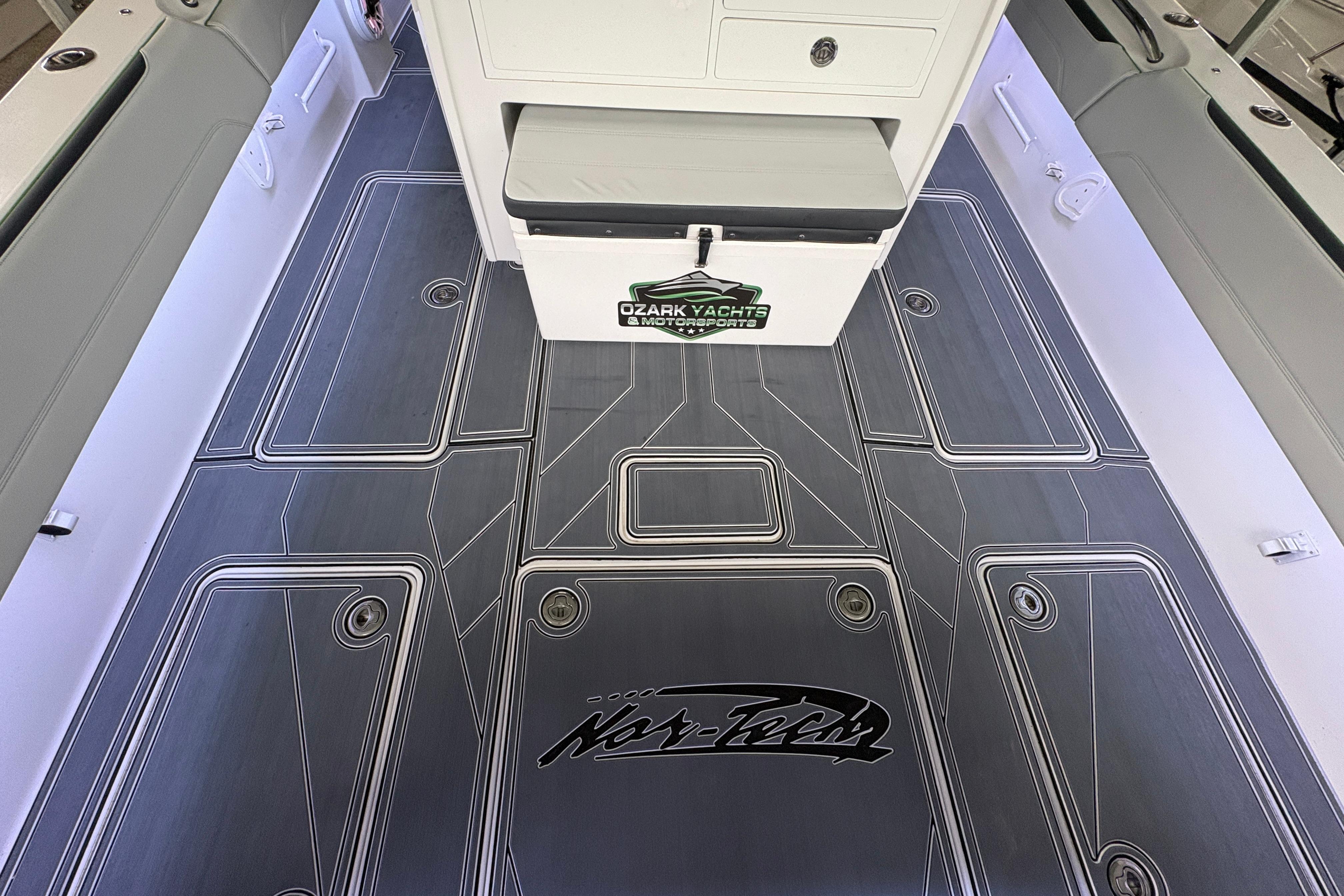 2022 Nor-Tech 392 Super Fish boat interior with custom flooring and storage compartments.