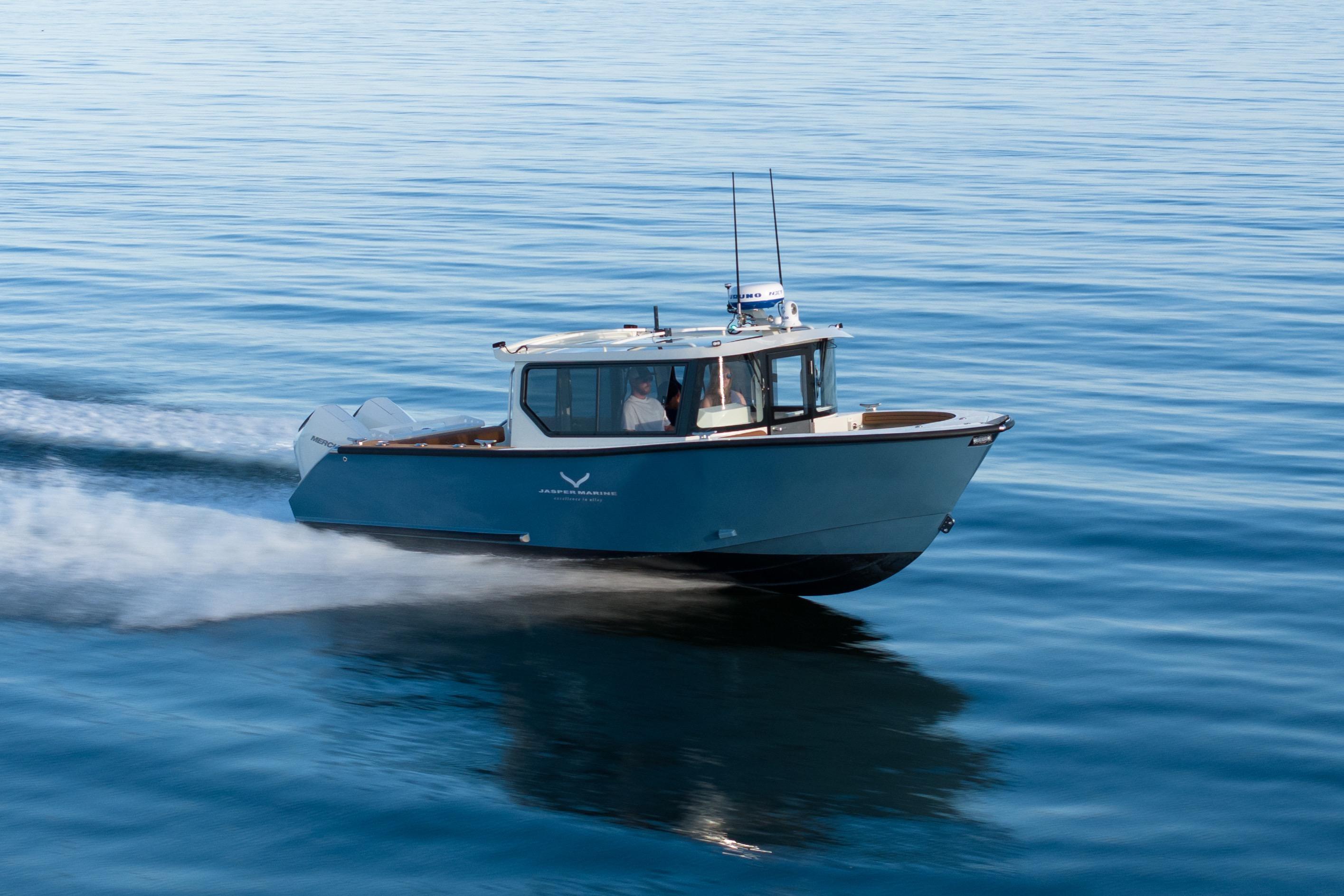 2026 Jasper Marine Defender 22 cruising on calm blue waters.