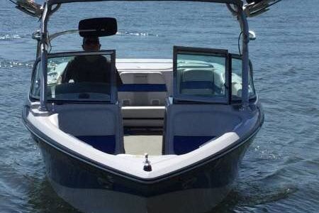2008 Nautique Super Air Nautique 220 on the water.