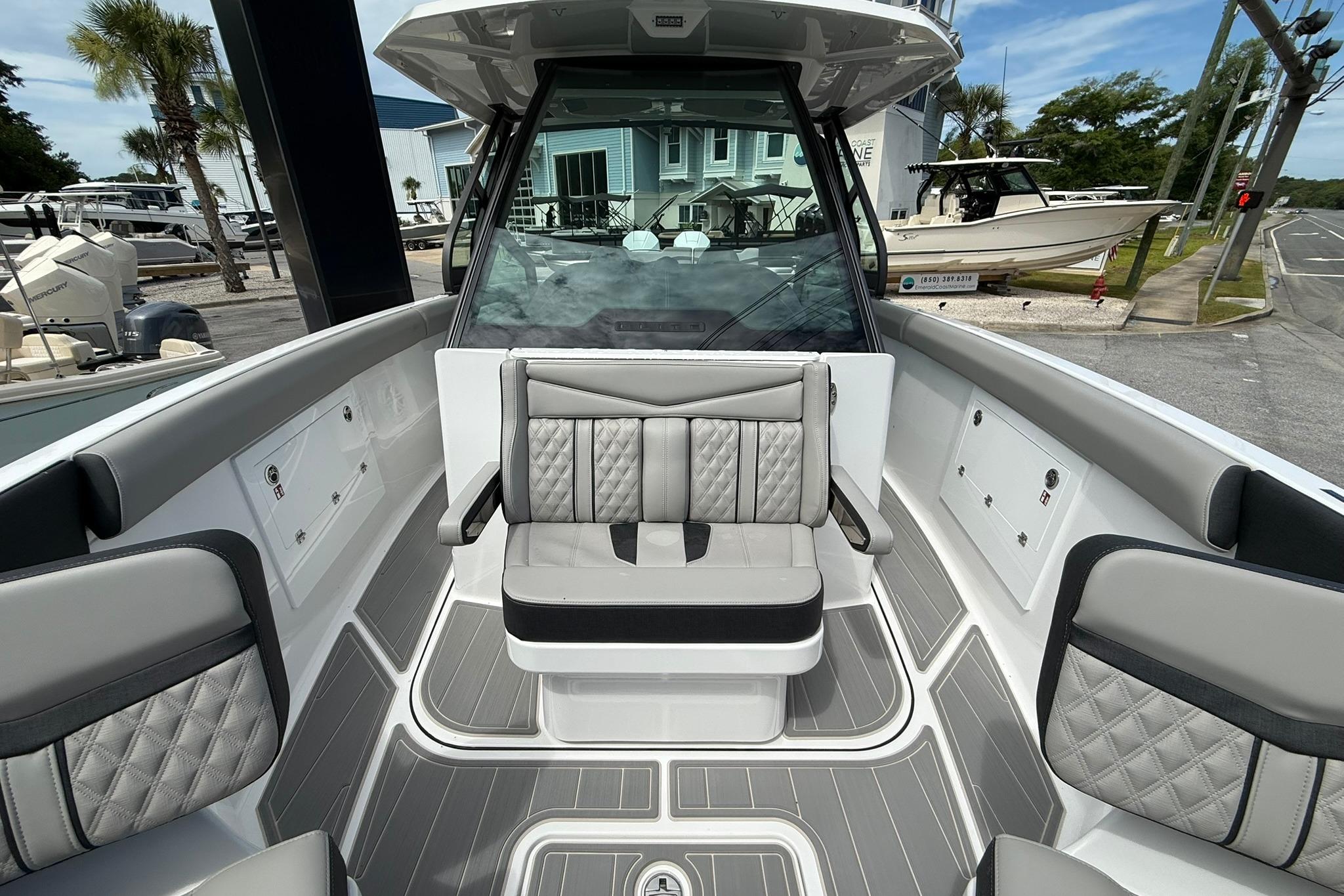 2027 Monterey Elite 30 OB boat interior with modern seating and sleek design.
