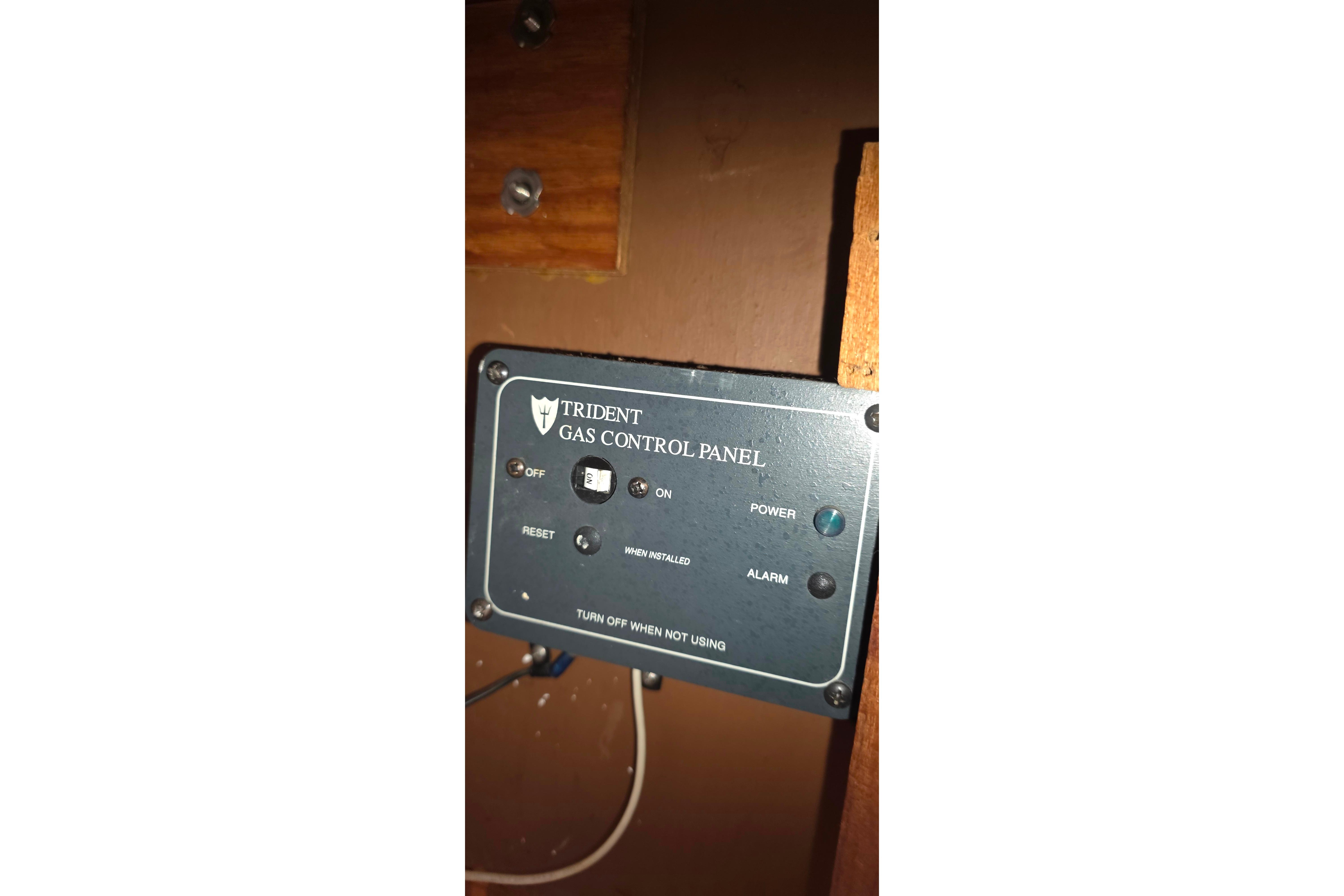 Trident gas control panel on 1978 Islander Freeport 41 yacht interior.