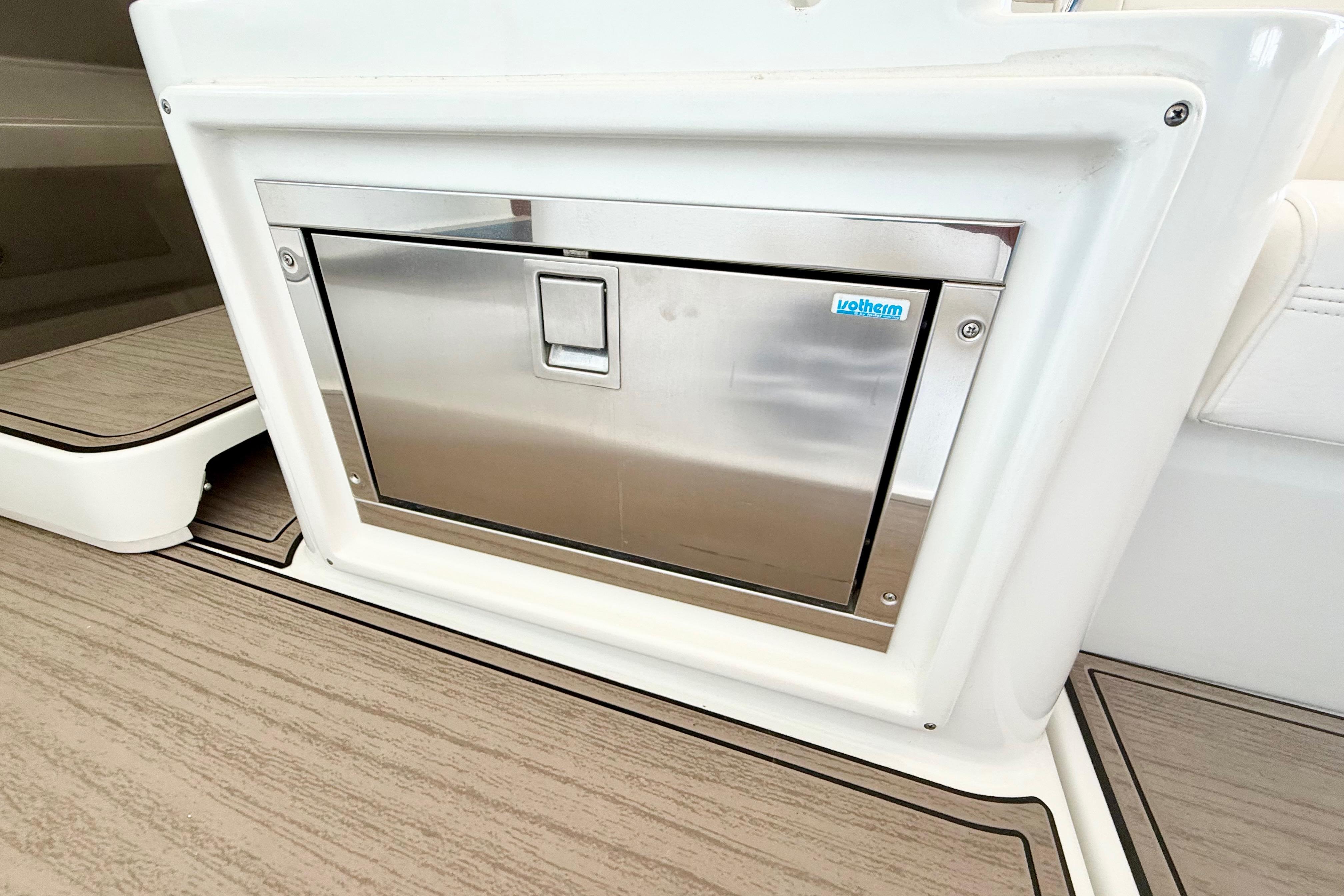 Stainless steel compartment on 2011 Cruisers Yachts 390 Sports Coupe, featuring sleek design.