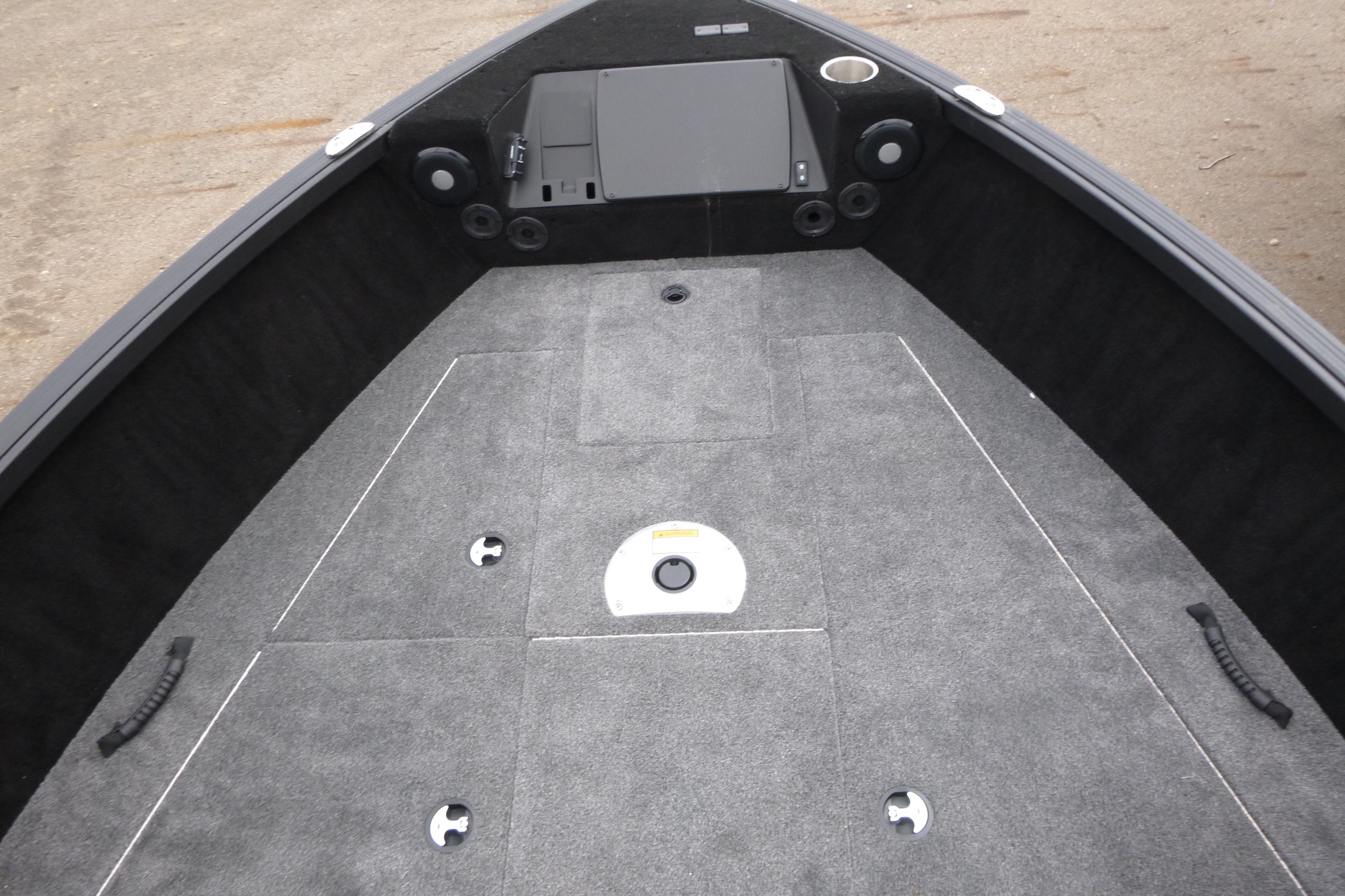 2025 Alumacraft Trophy 185X Sport boat interior with carpeted deck and storage compartments.