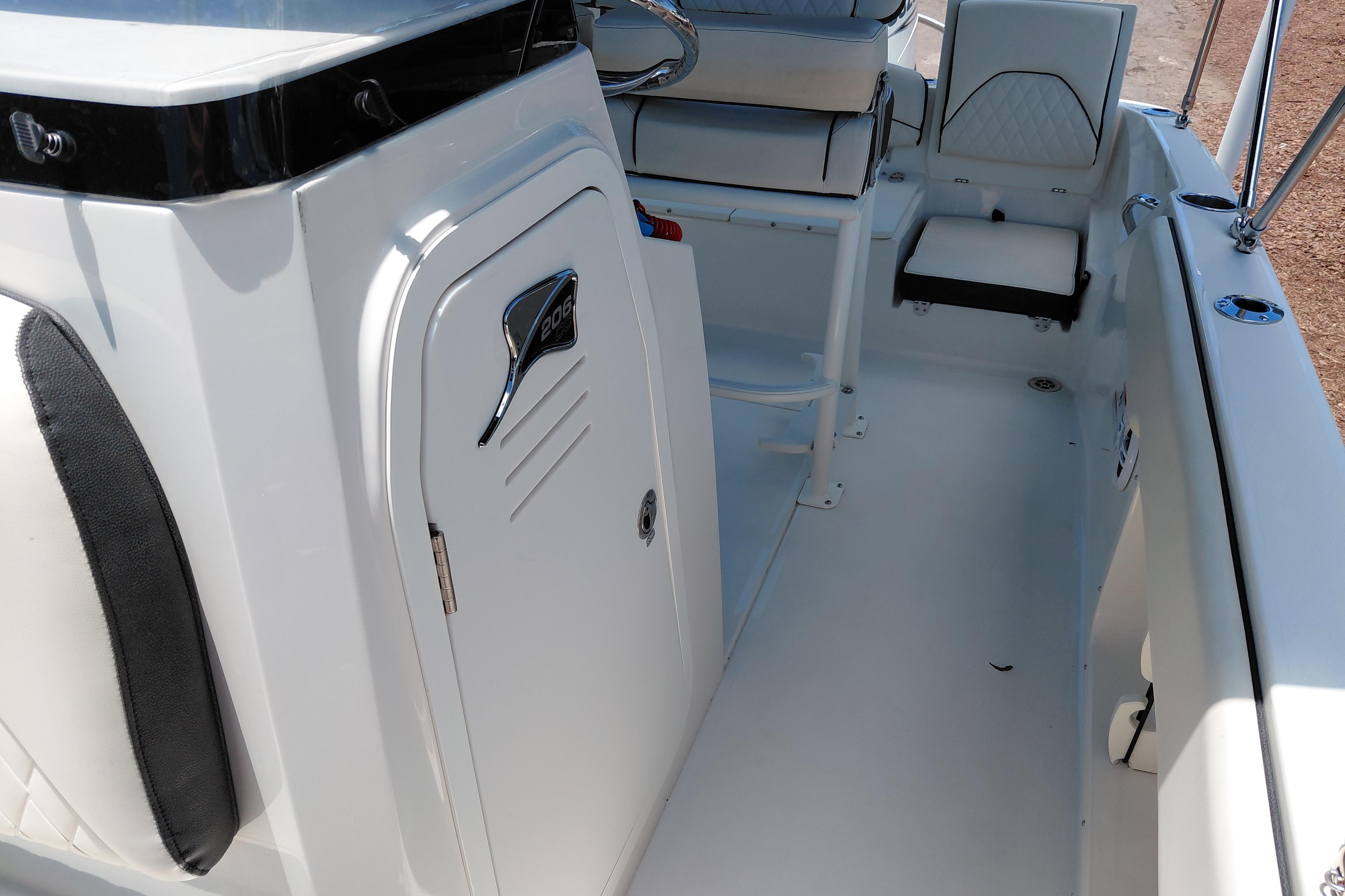 2023 Stingray 206 CC boat interior with seating and storage compartments.