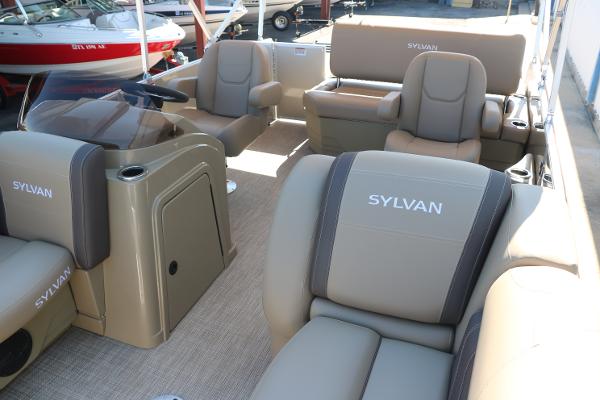 2025 Sylvan Mirage 820 CLZ DH pontoon boat interior with luxurious seating.