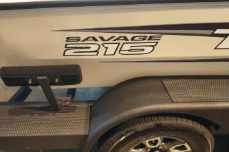 2025 Tracker Savage 215 boat trailer with logo and tire detail.