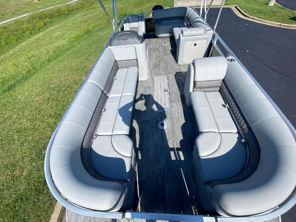 2024 Ranger Reata 223C pontoon boat with spacious seating and modern design.