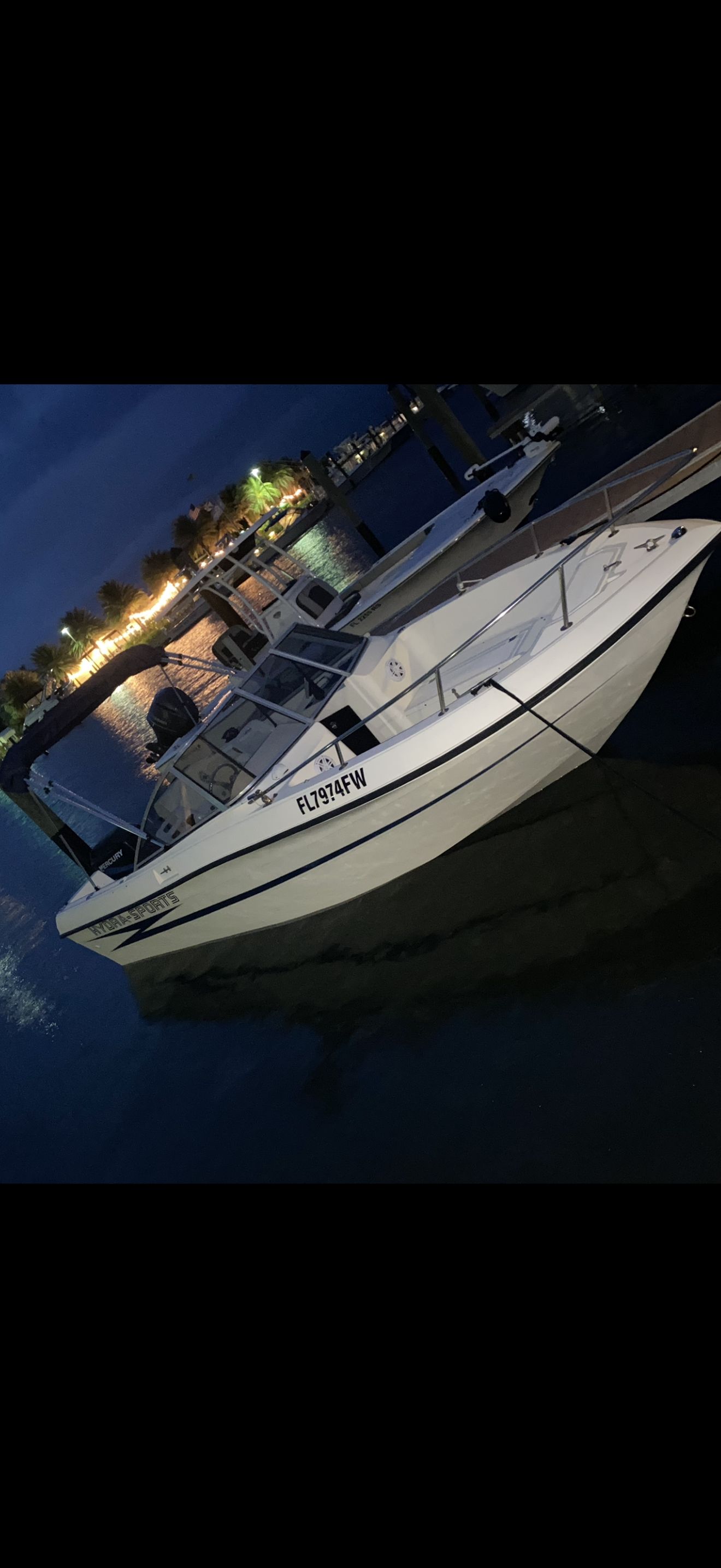 1991 Hydra-Sports DC 2000 boat docked at night.