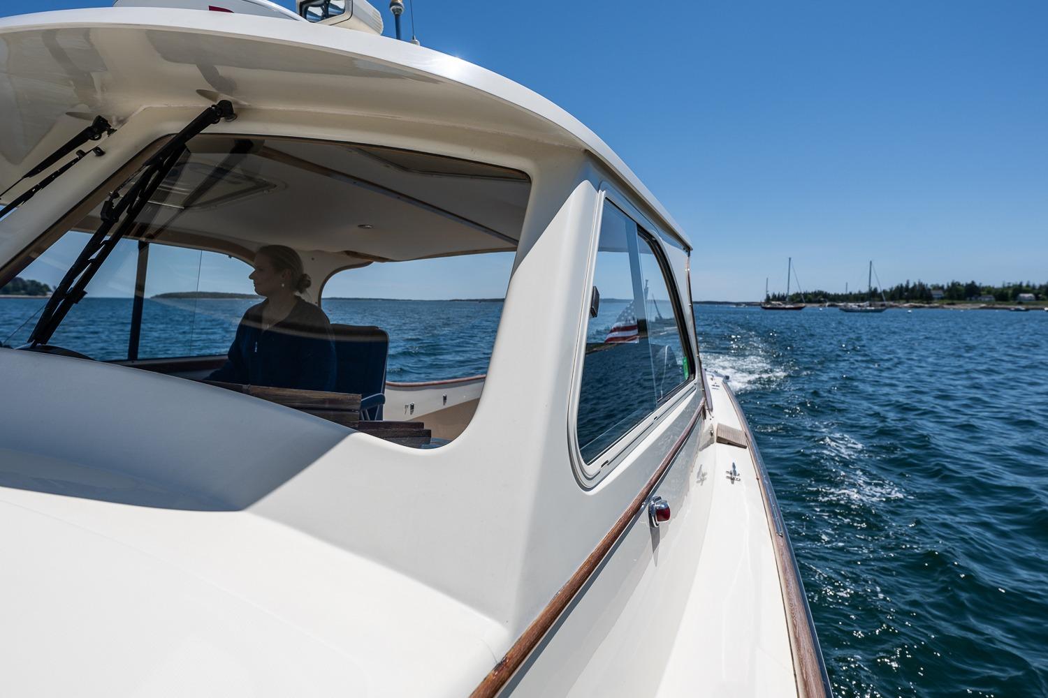 2001 Hinckley Picnic Boat 36 Classic cruising on a sunny day, with scenic ocean views.