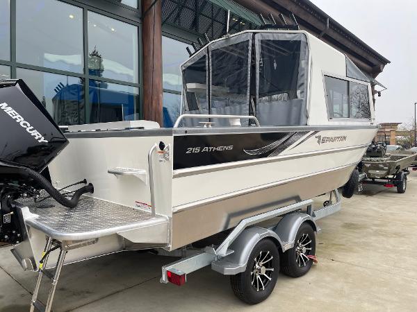 2024 Spartan 215 Athens boat on trailer, featuring a Mercury outboard motor.