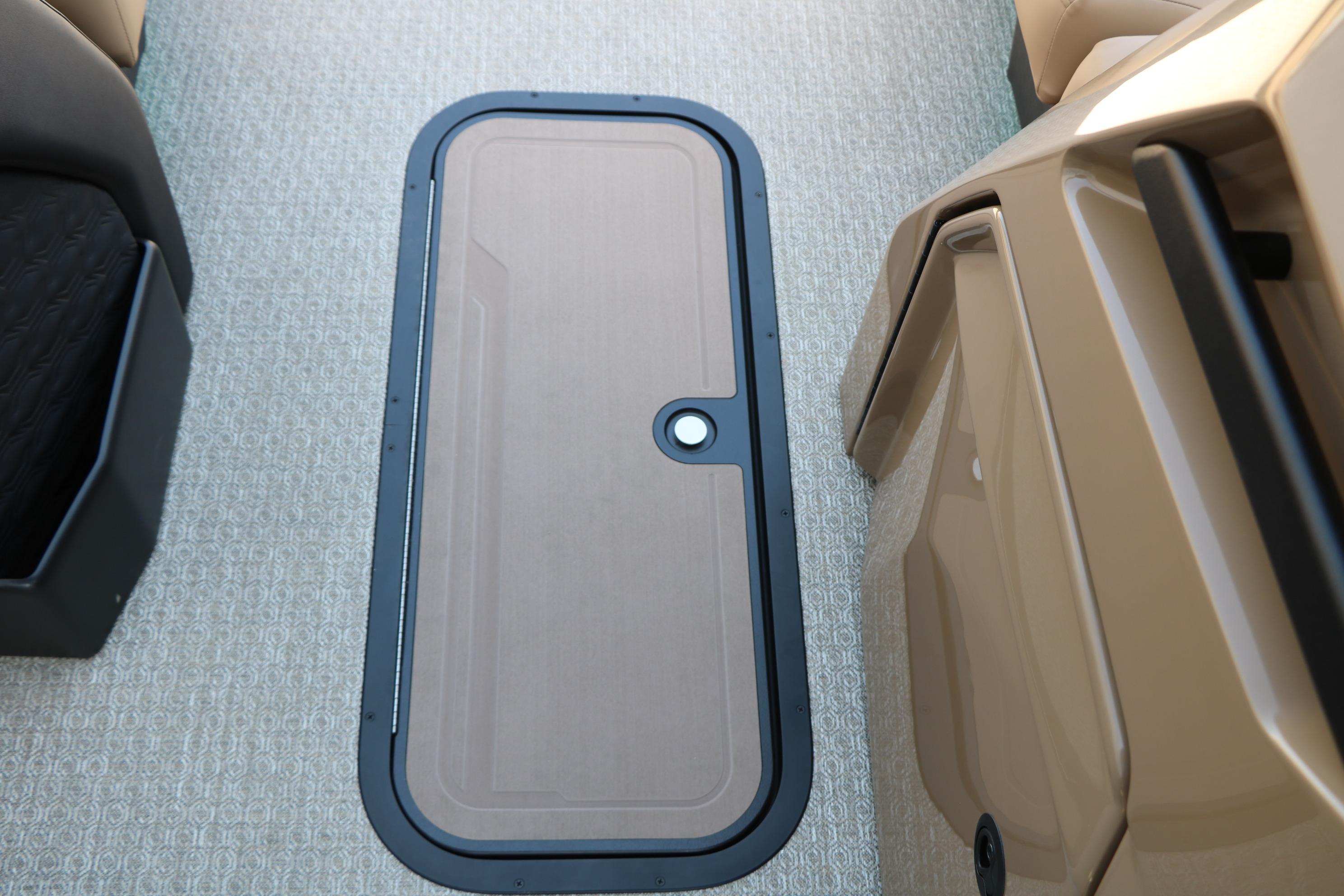 Interior view of 2026 Evotti 725 CS Tri-Toon boat, featuring sleek flooring design.