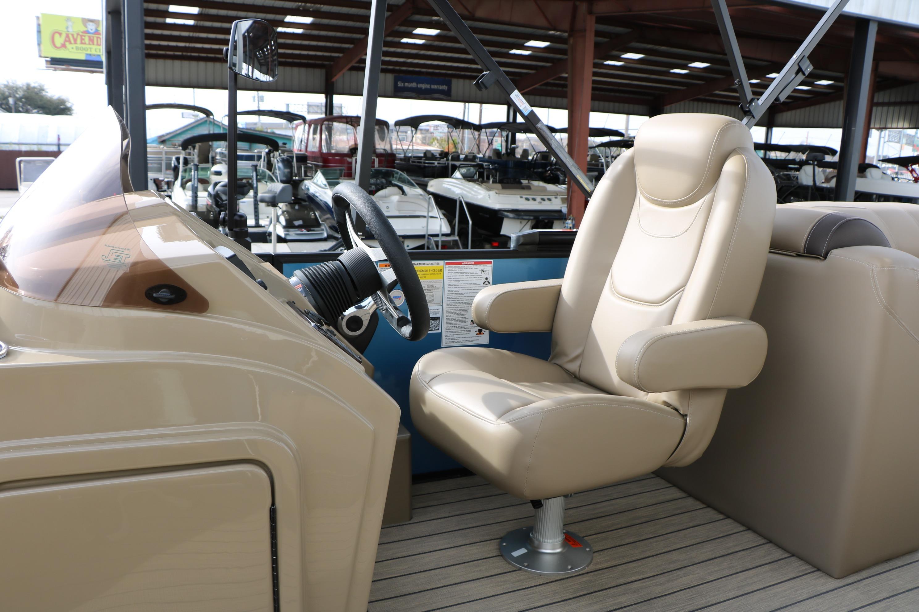 Captain's chair and helm of 2026 Sylvan Mirage 822 LZ pontoon boat.