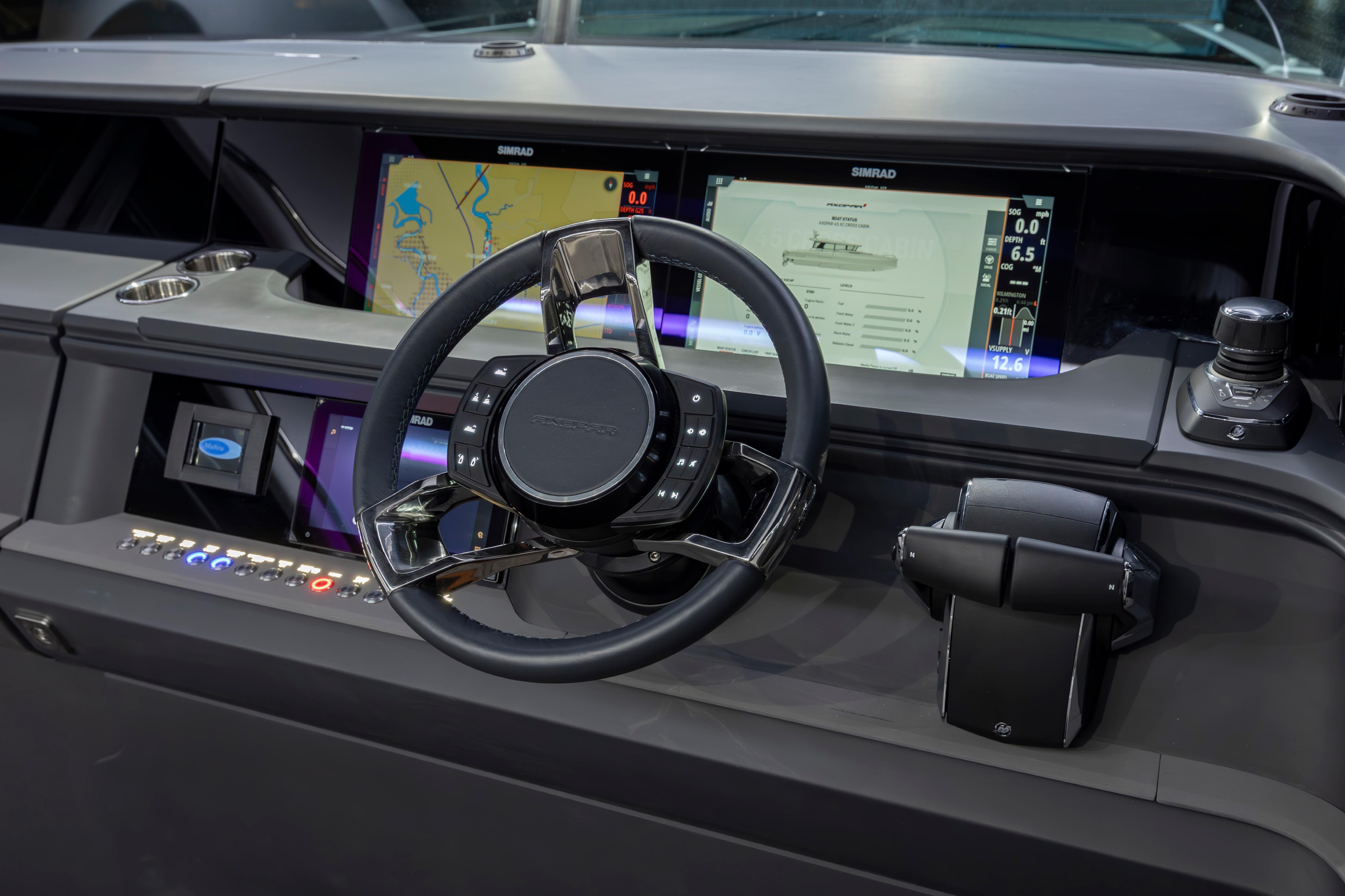 Dashboard of 2027 Axopar 45 XC Cross Cabin with advanced navigation displays.