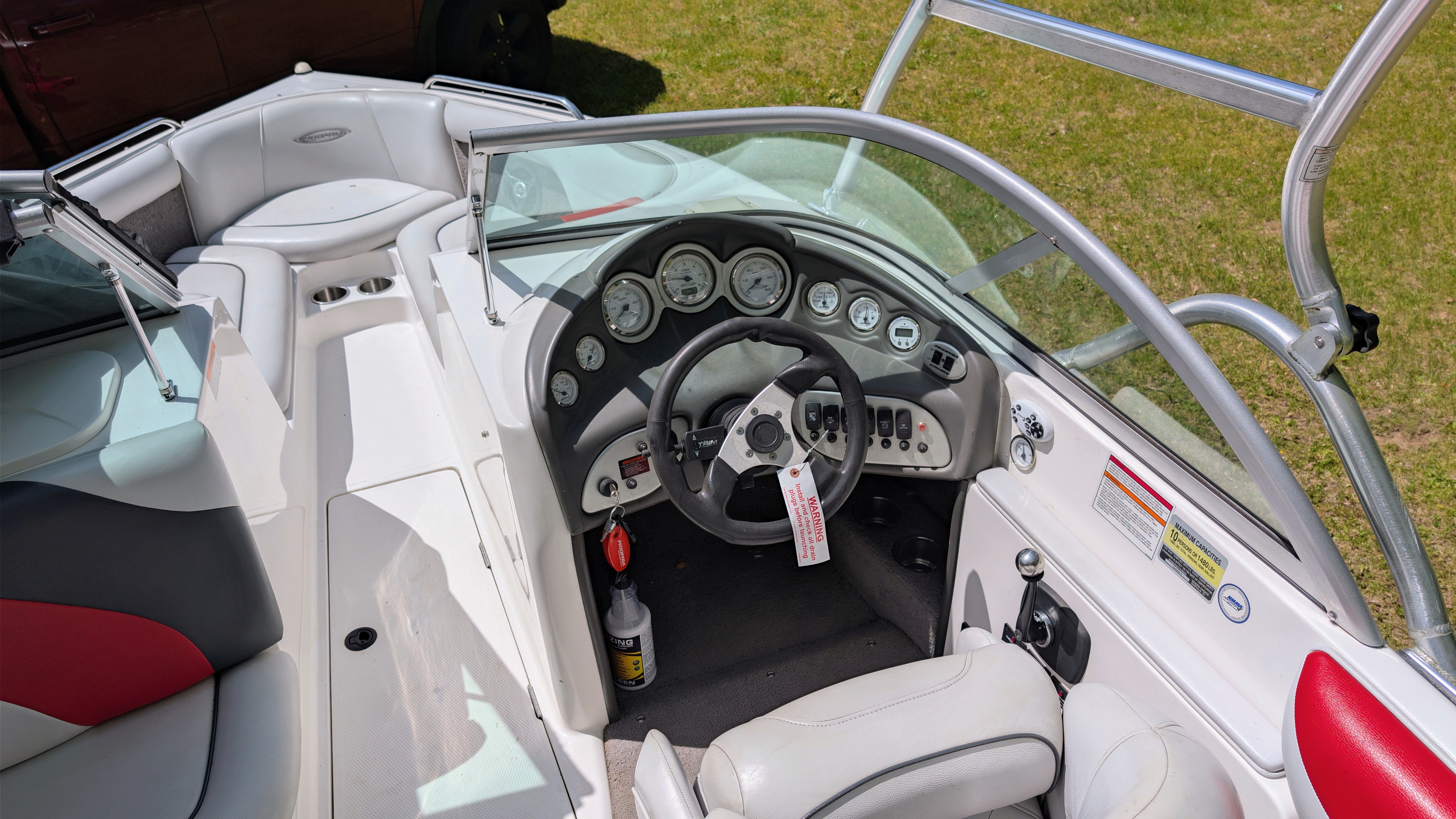 Interior of a 2007 Moomba Outback V boat with steering console.