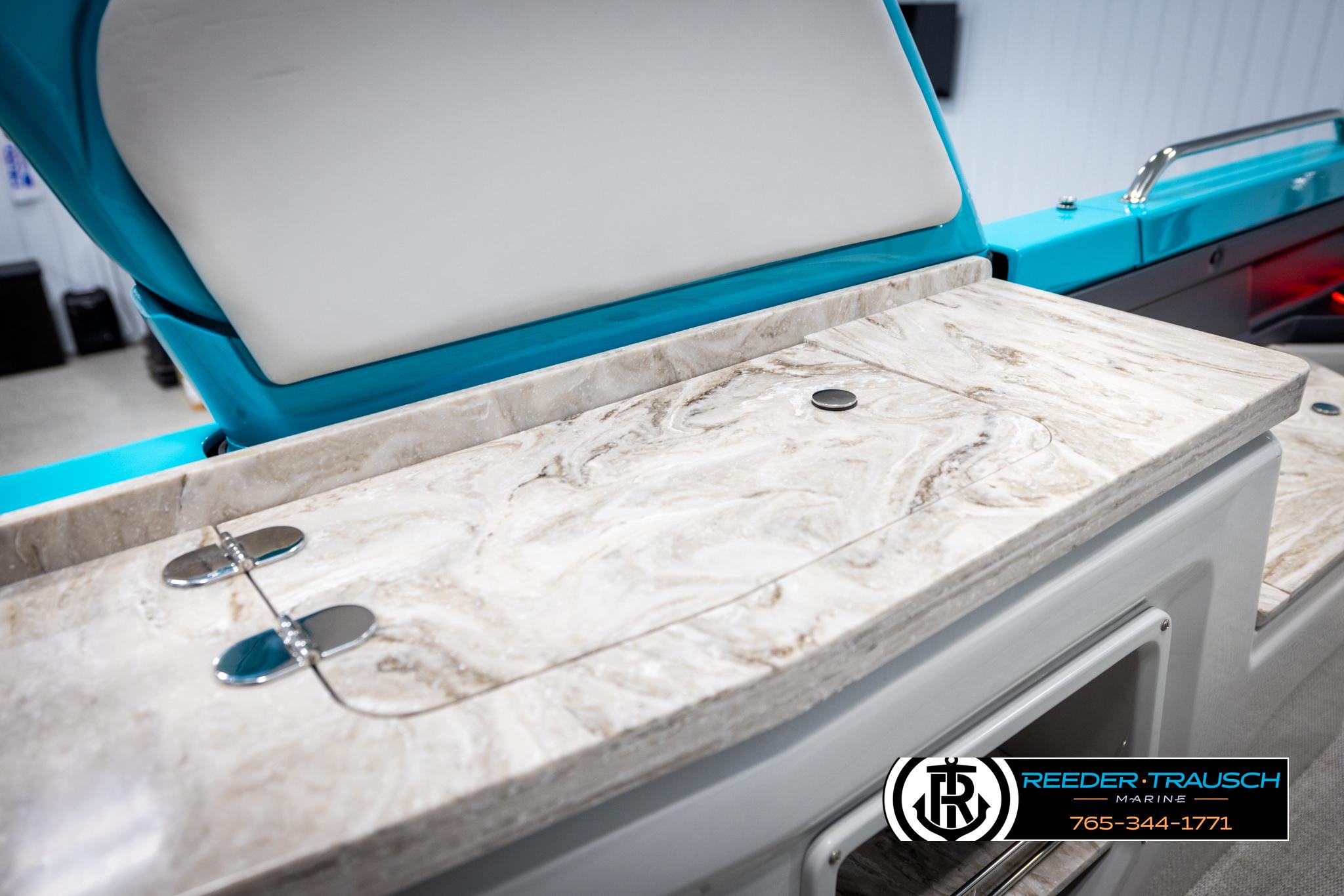 Luxurious interior of 2025 Avalon 2585 Excal VRBW boat with marble countertop.