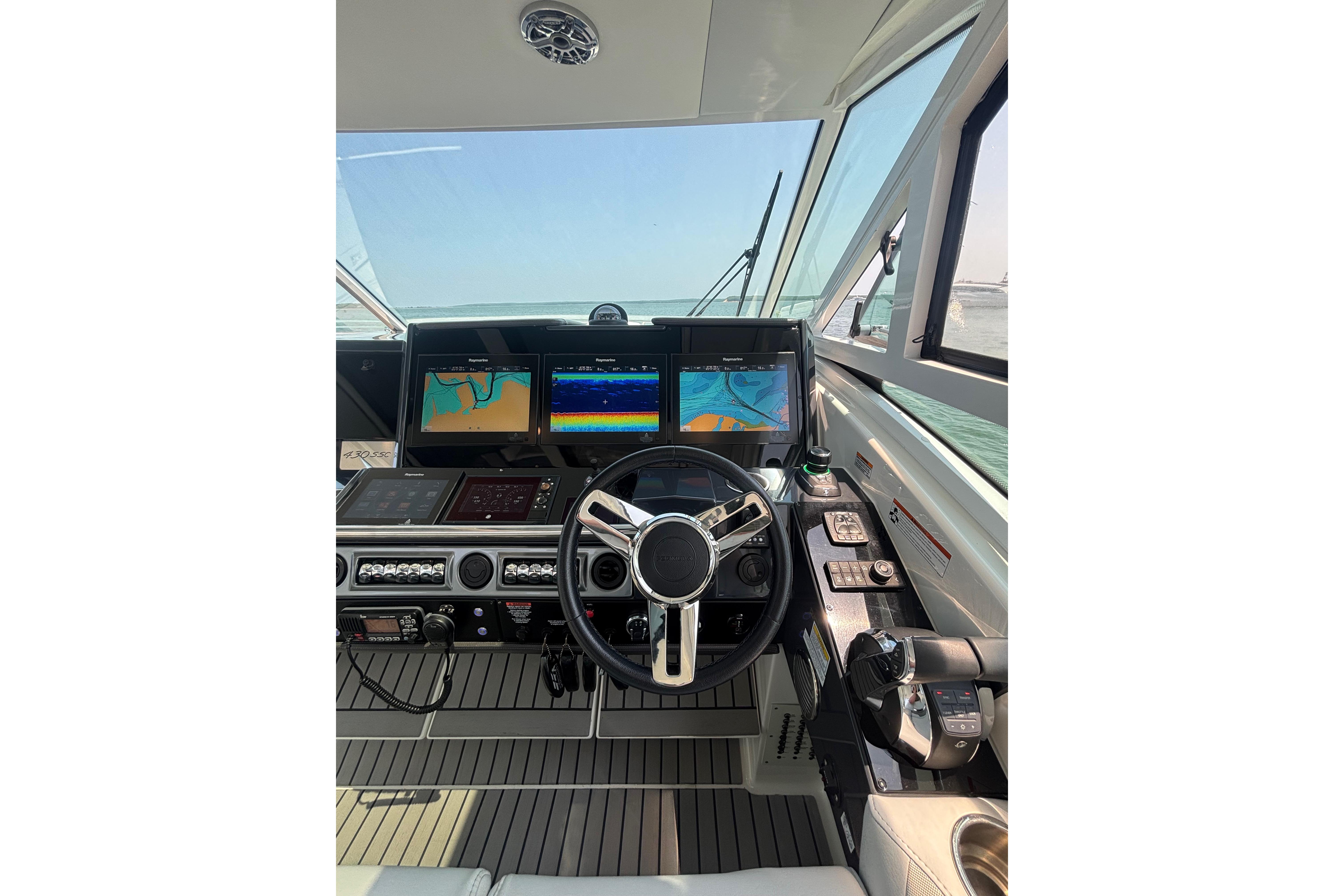 Cockpit of 2019 Formula 430 Super Sport Crossover with advanced navigation displays.