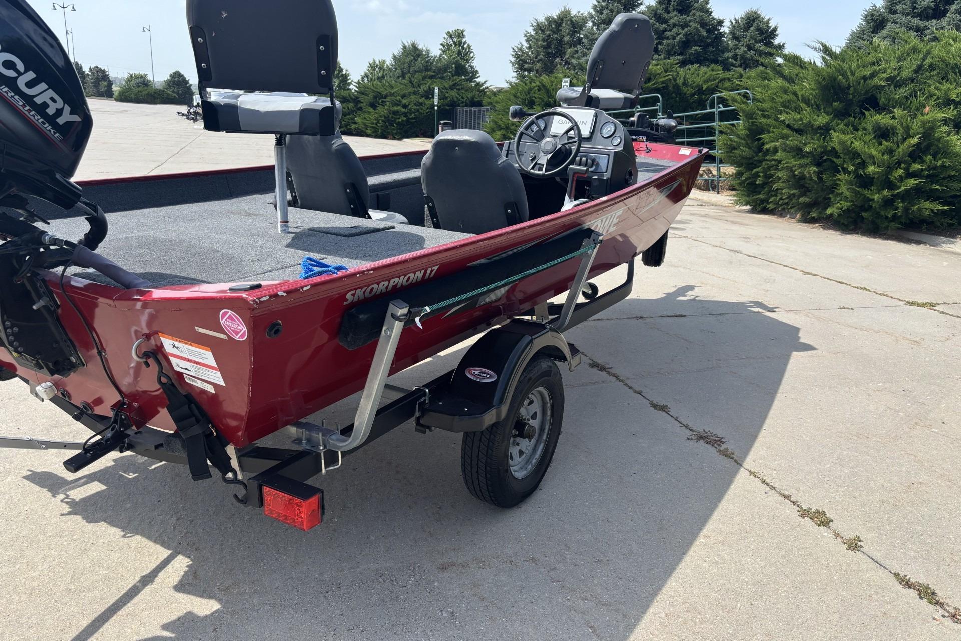2019 Lowe Skorpion 17 fishing boat on trailer, featuring Mercury outboard motor.
