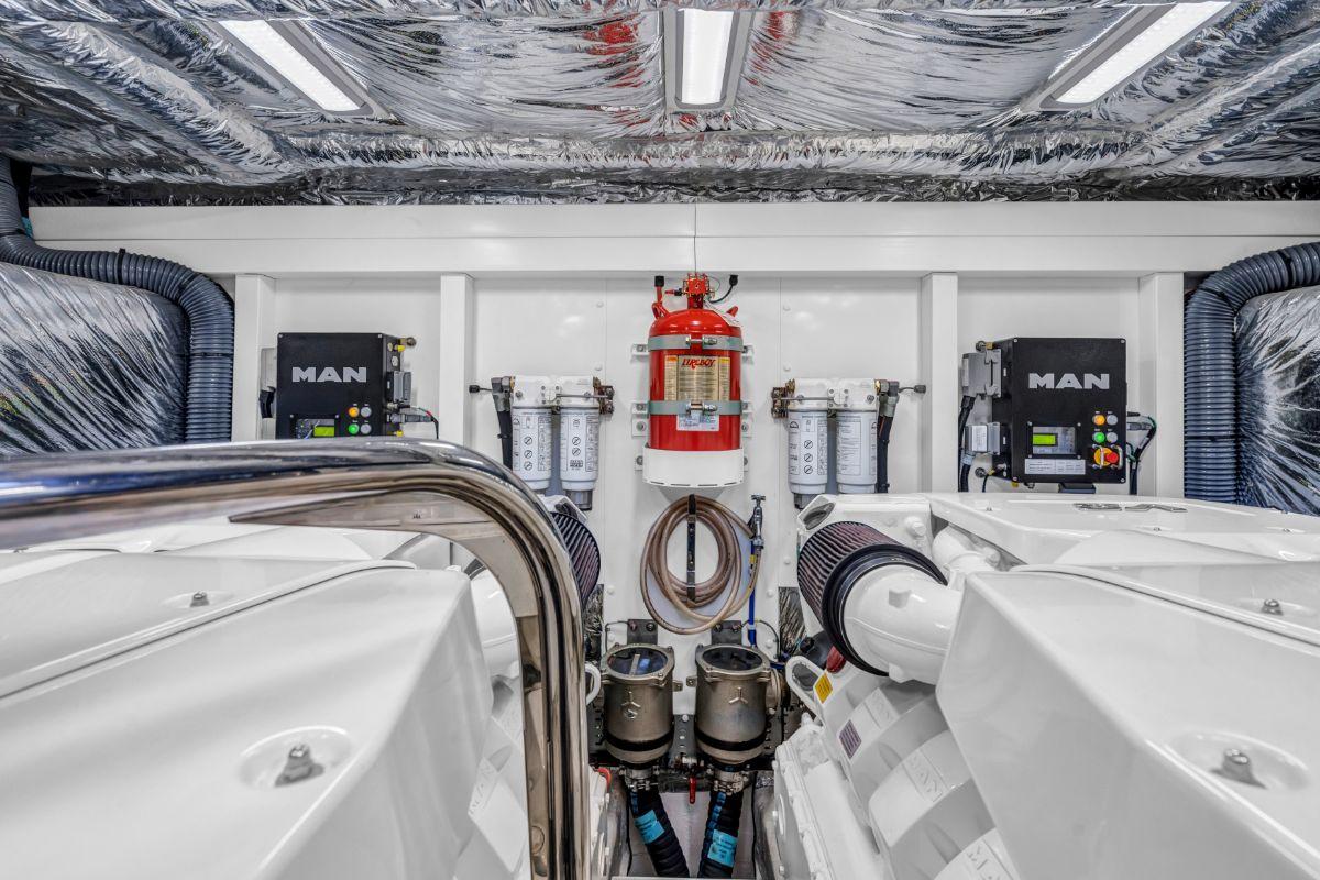 Engine room of 2018 Princess S60 yacht with MAN engines and fire safety equipment.