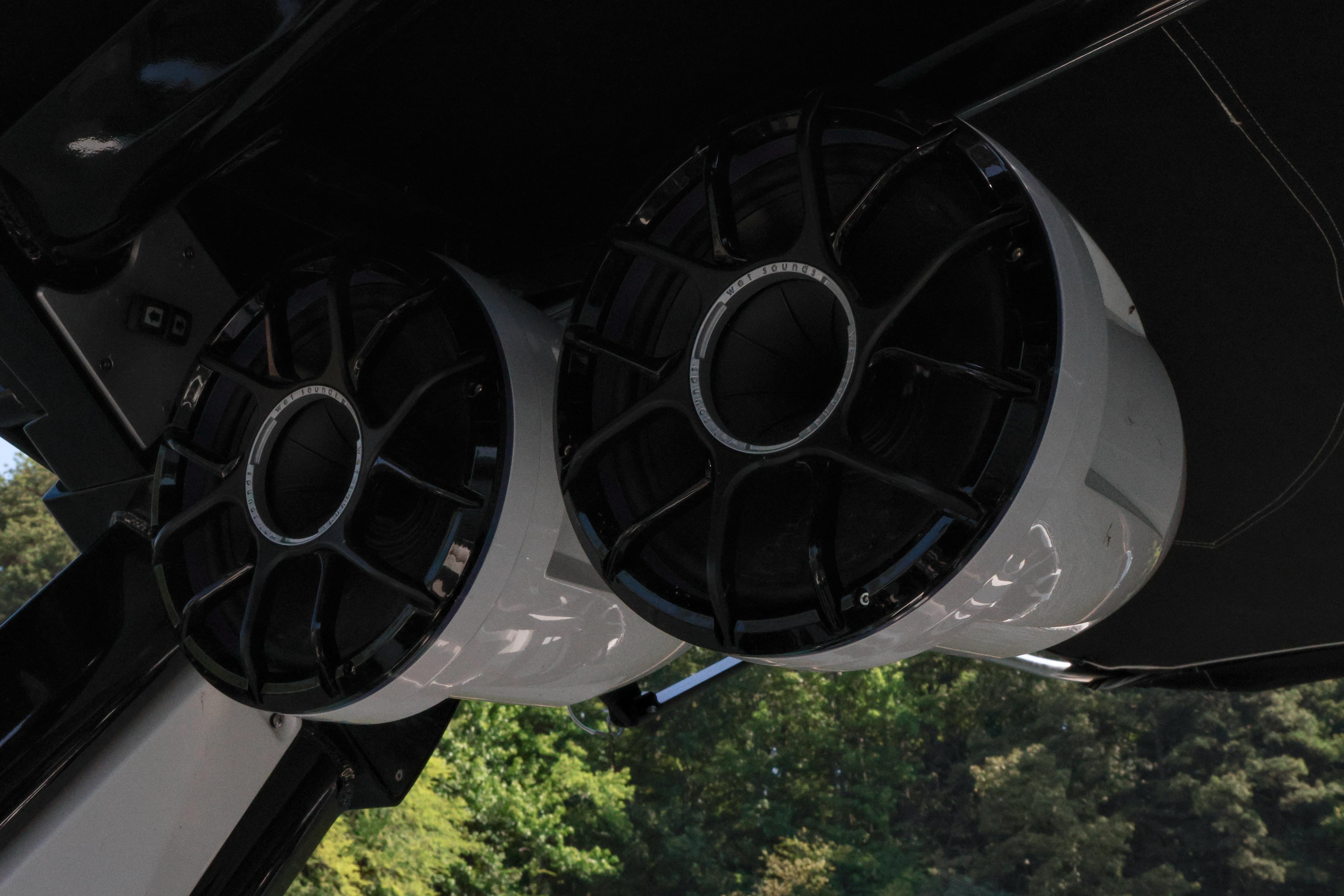 2022 Centurion Ri265 boat speakers, black and white design, mounted under canopy.