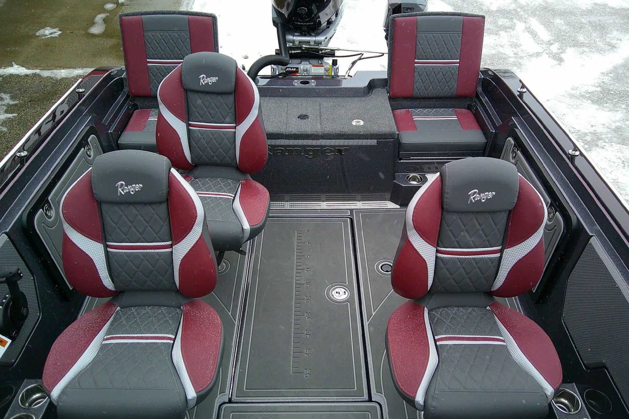 2026 Ranger 620xFS Pro boat interior with red and gray seating, showcasing premium design.