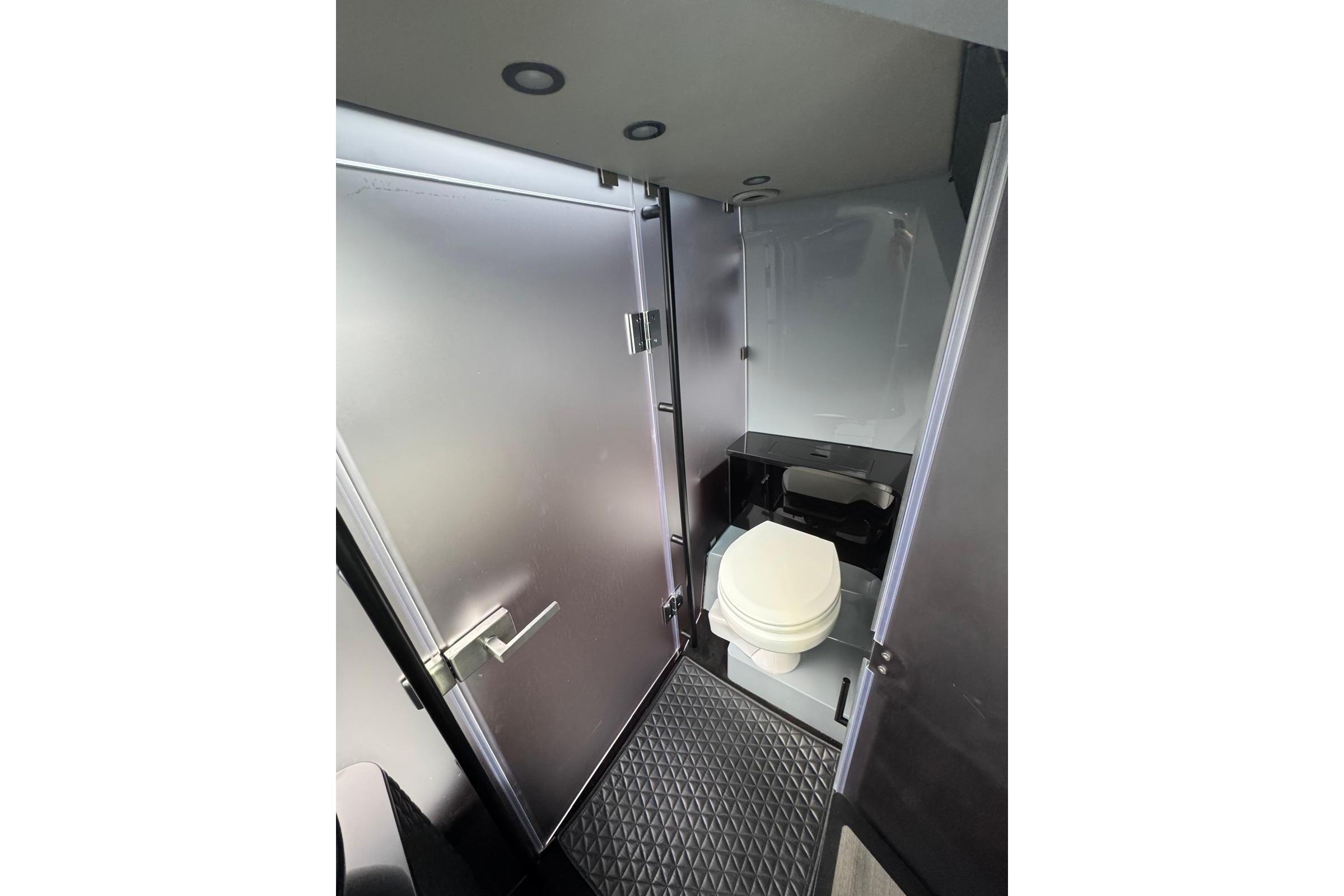 Modern bathroom interior of 2023 BRABUS Shadow 900 ST boat, featuring sleek design and amenities.