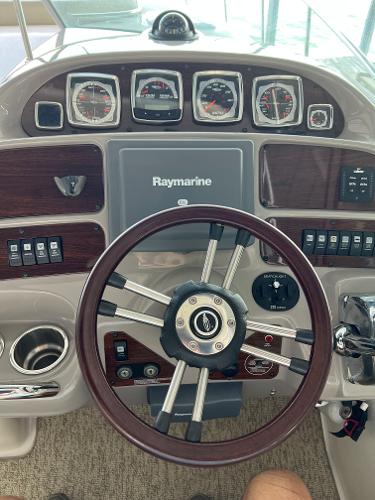 Dashboard of a 2008 Chaparral Signature 310 boat with Raymarine system.