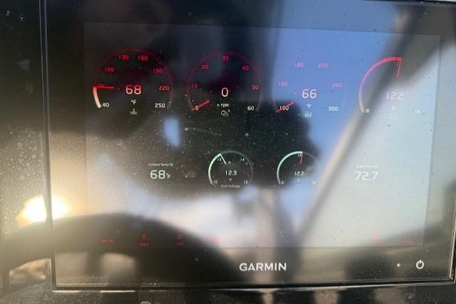 Garmin display on 2023 Cobalt R6 Surf showing various gauges and readings.