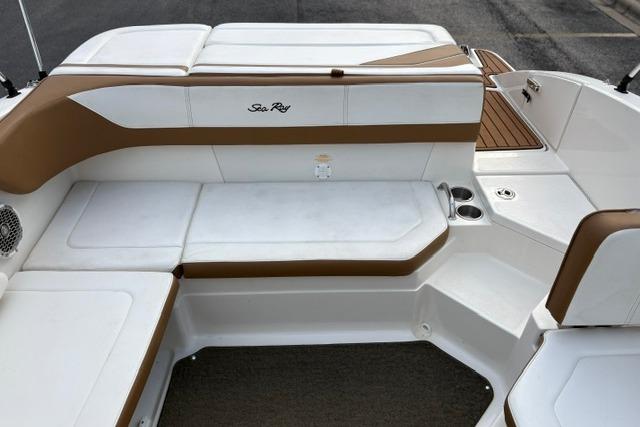 2017 Searay SPX210 boat interior with white and brown seating, cup holders, and deck view.