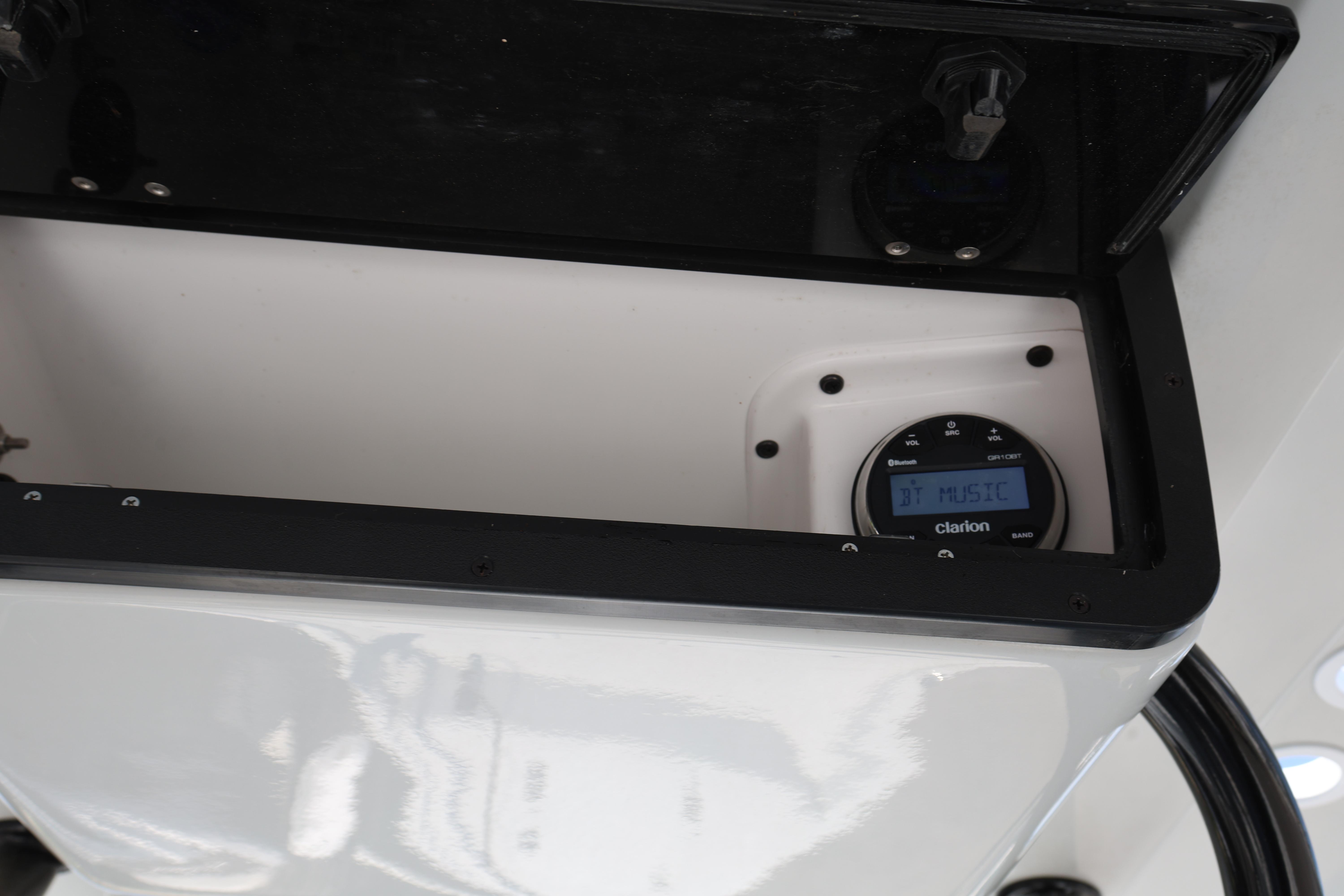 2021 Blazer Bay 2400 boat console with Clarion Bluetooth music system.