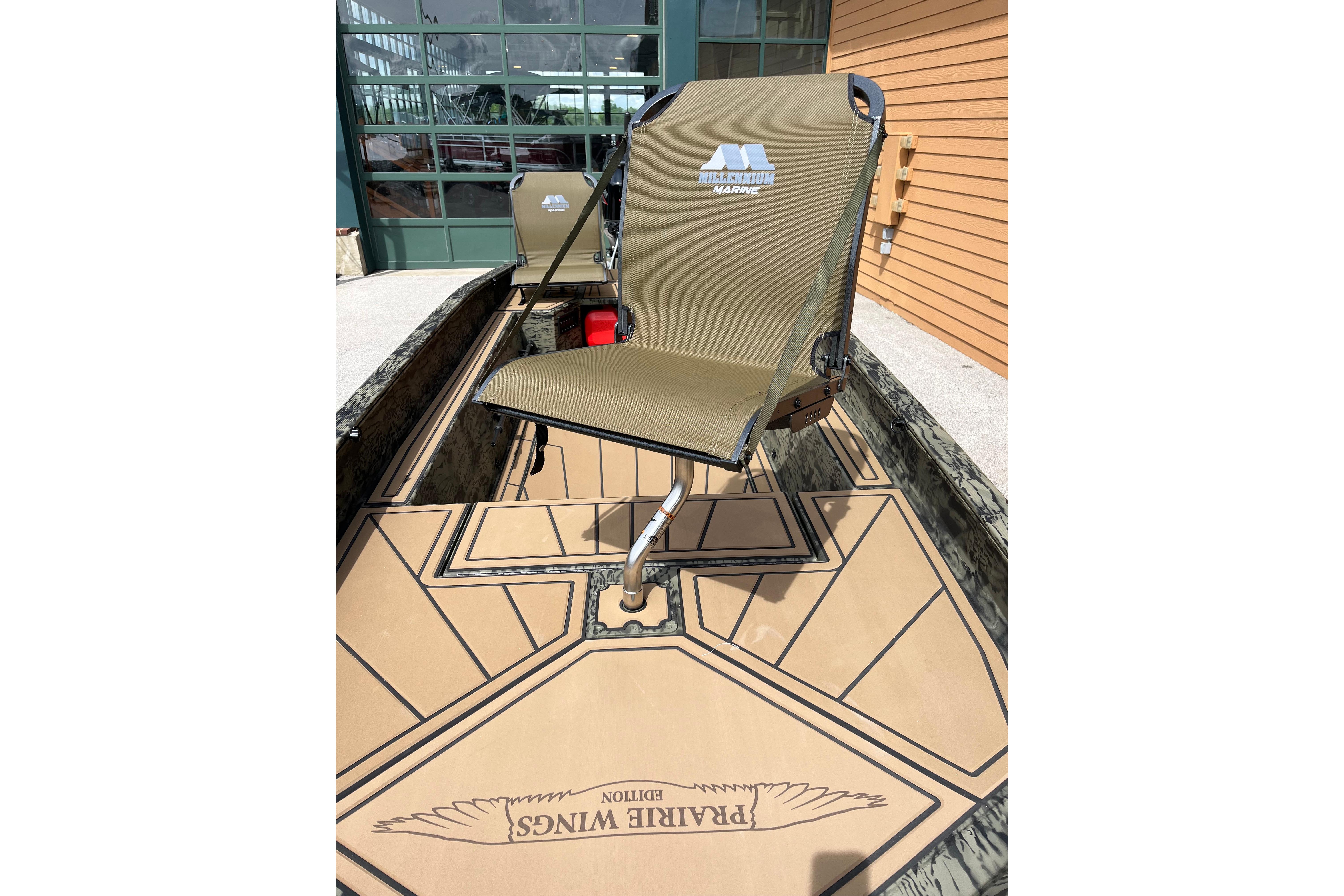 2026 Tracker Grizzly 1650 T Prairie Wings Edition boat with Millennium Marine seating.